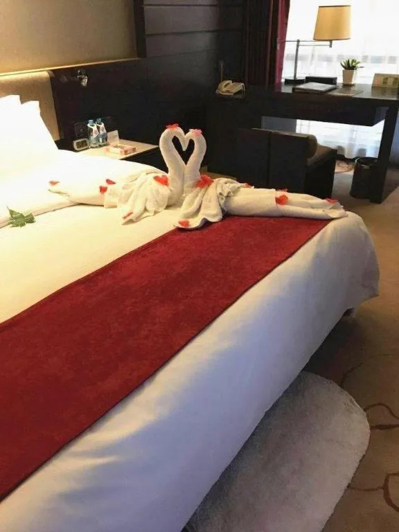 Bed in Changsha Jasmine International Hotel