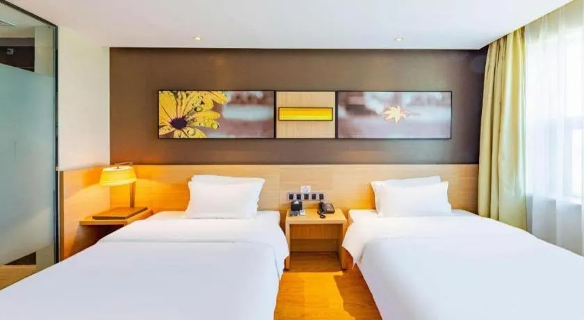 Bed in IU Hotel Tianjin Tianta Scenic Spot Wujiayao Metro Station