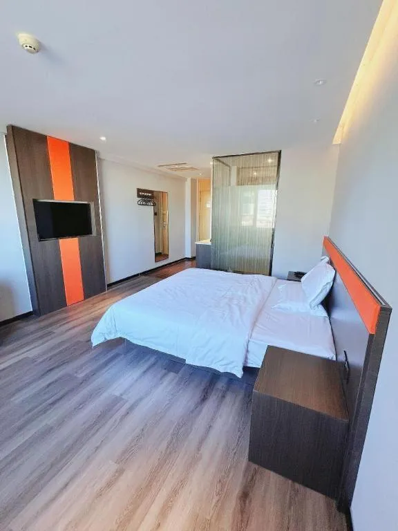 Bed in IU Hotel Tianjin Tianta Scenic Spot Wujiayao Metro Station