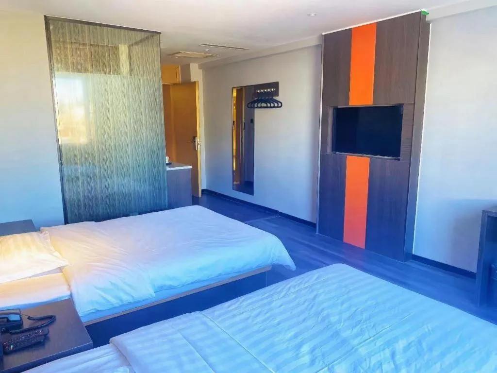Bed in IU Hotel Tianjin Tianta Scenic Spot Wujiayao Metro Station