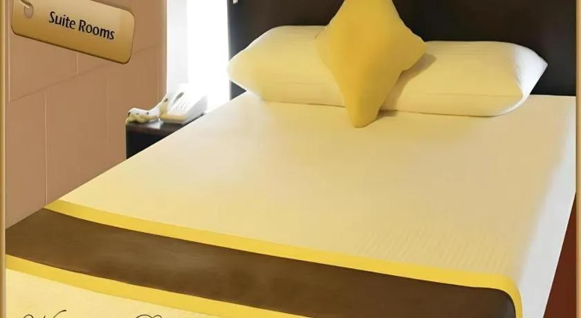 Bed in Peninsula International Hotel