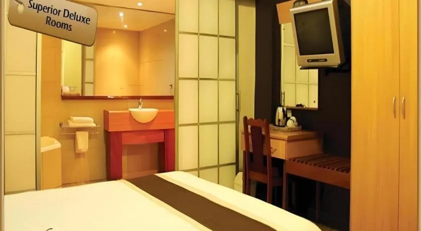 Bed in Peninsula International Hotel