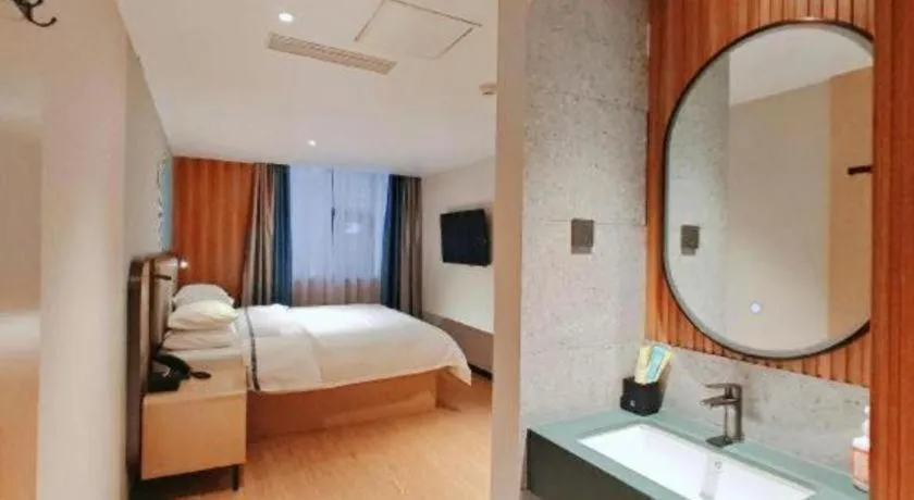 Bed in City Comfort Inn Guangzhou Jiaokou Metro Station