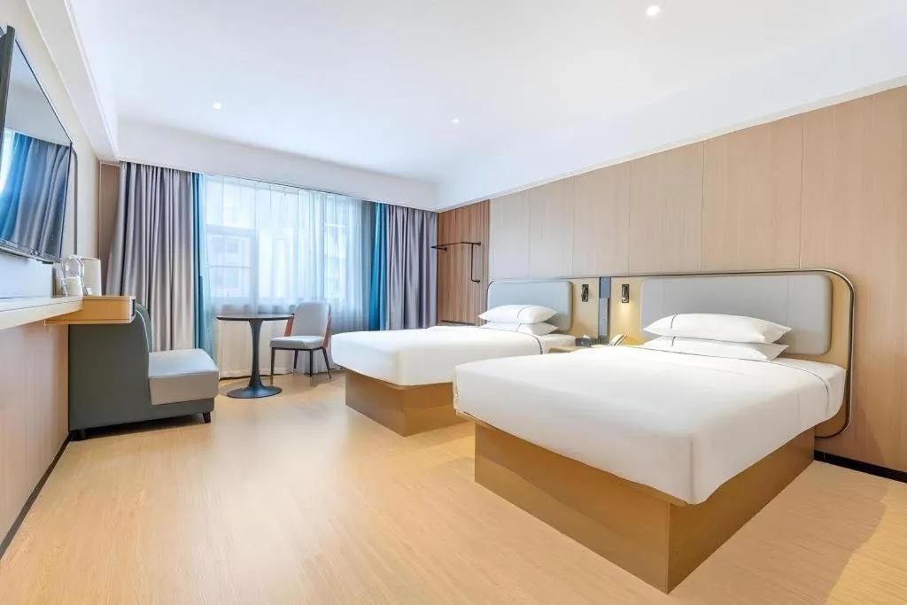 Bed in City Comfort Inn Guangzhou Jiaokou Metro Station