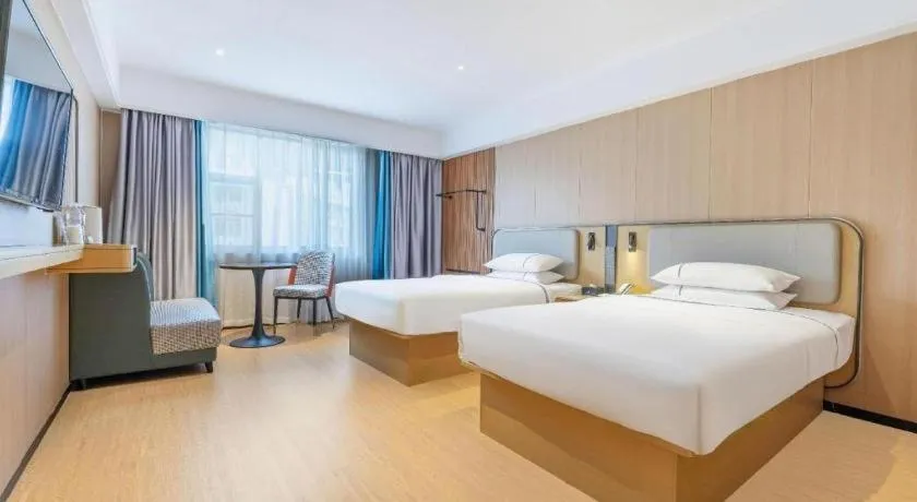 Bed in City Comfort Inn Guangzhou Jiaokou Metro Station