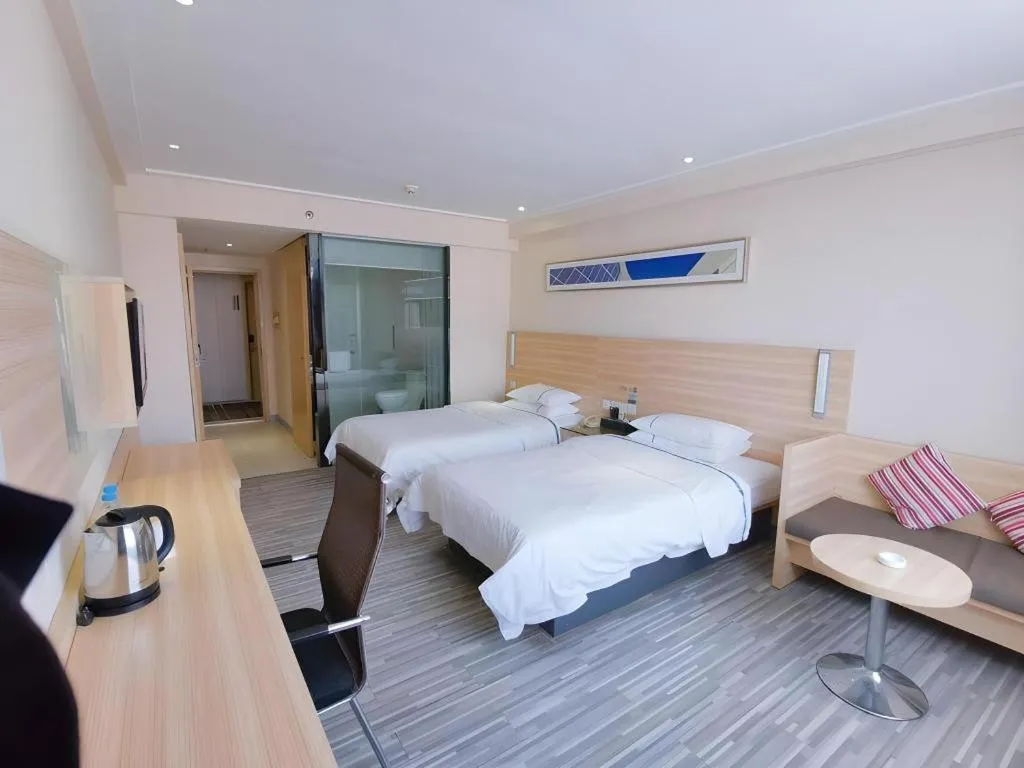 Bed in City Comfort Inn Guangzhou Jiaokou Metro Station