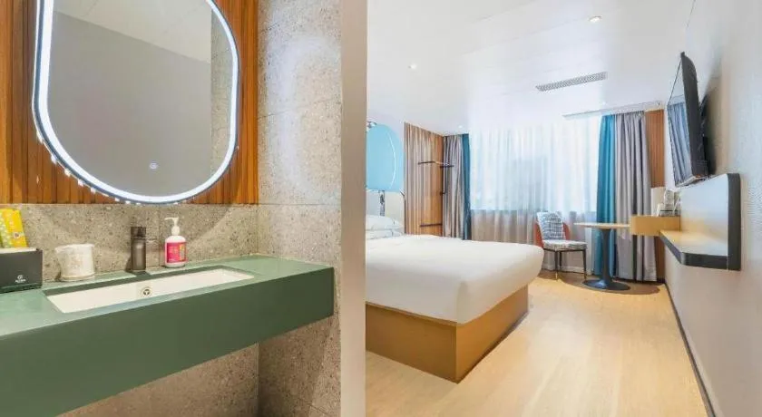 Bed in City Comfort Inn Guangzhou Jiaokou Metro Station