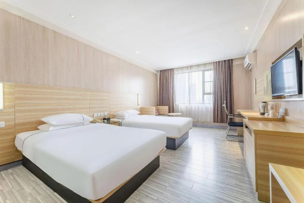 Bed in City Comfort Inn Guangzhou Jiaokou Metro Station