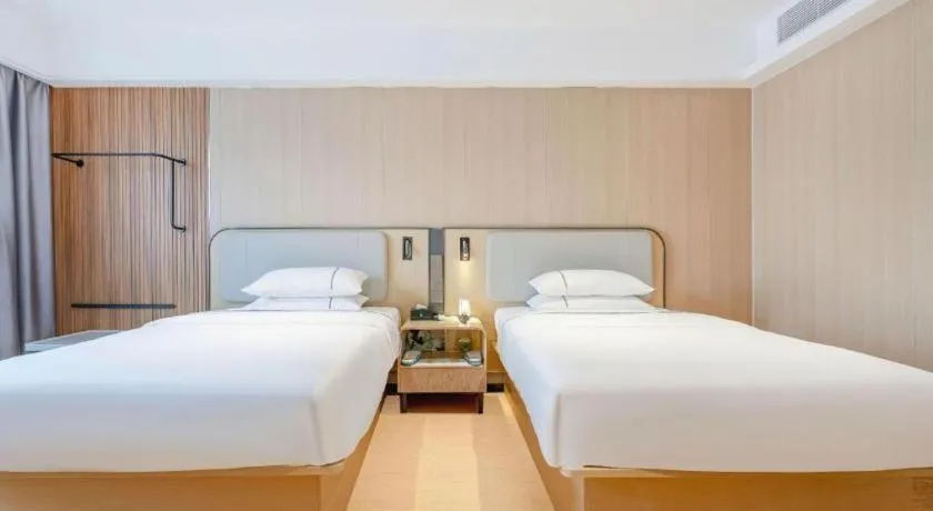 Bed in City Comfort Inn Guangzhou Jiaokou Metro Station