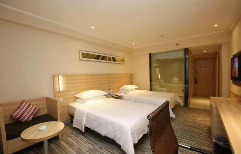 Bed in City Comfort Inn Guangzhou Jiaokou Metro Station