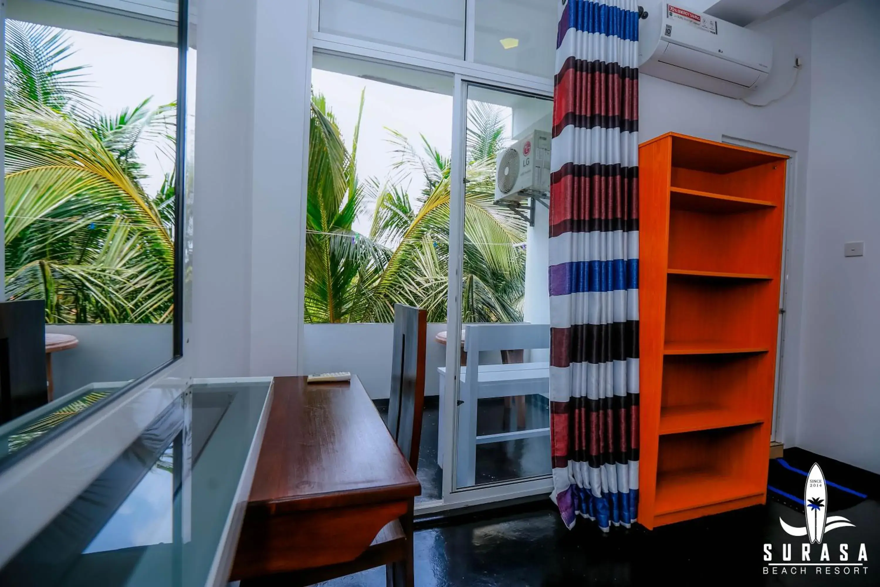 Deluxe Double Room with Balcony in Surasa Beach Resort Deluxe Double Room with Balcony in Surasa Beach Resort