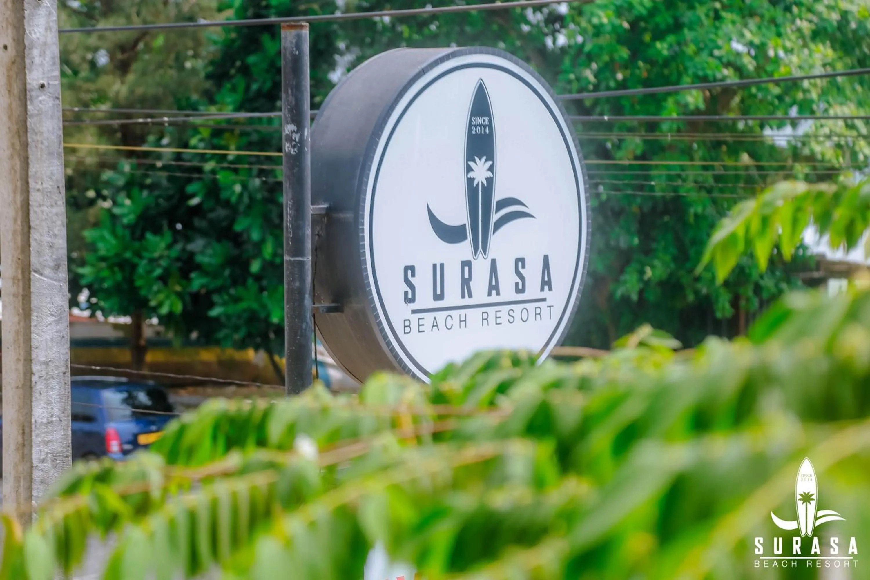 Property logo or sign in Surasa Beach Resort