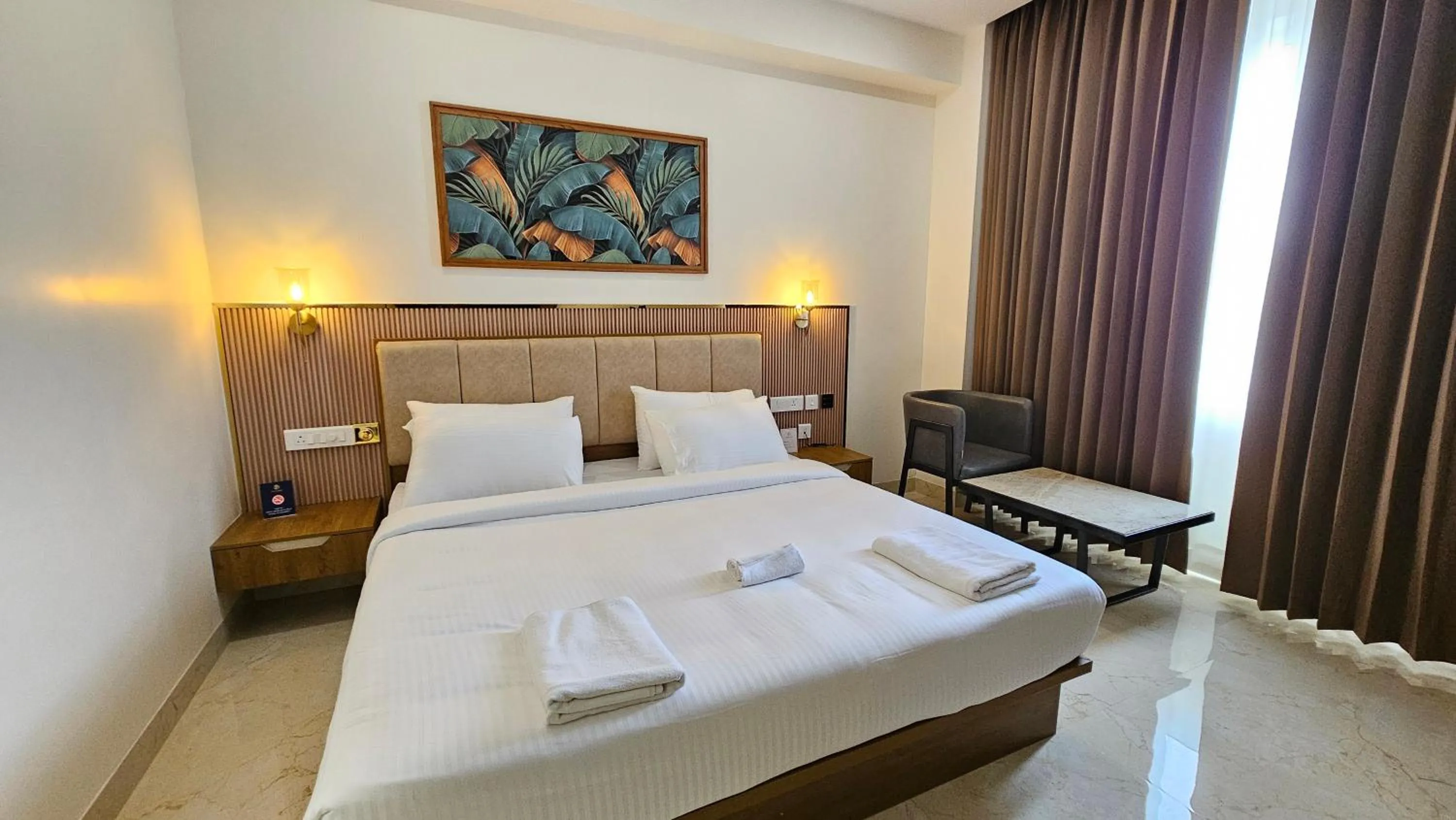 Bed in Prosland Hotel