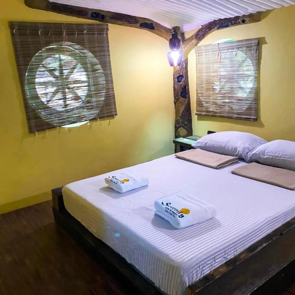 Bed in Serenity Farm and Resort by Hiverooms