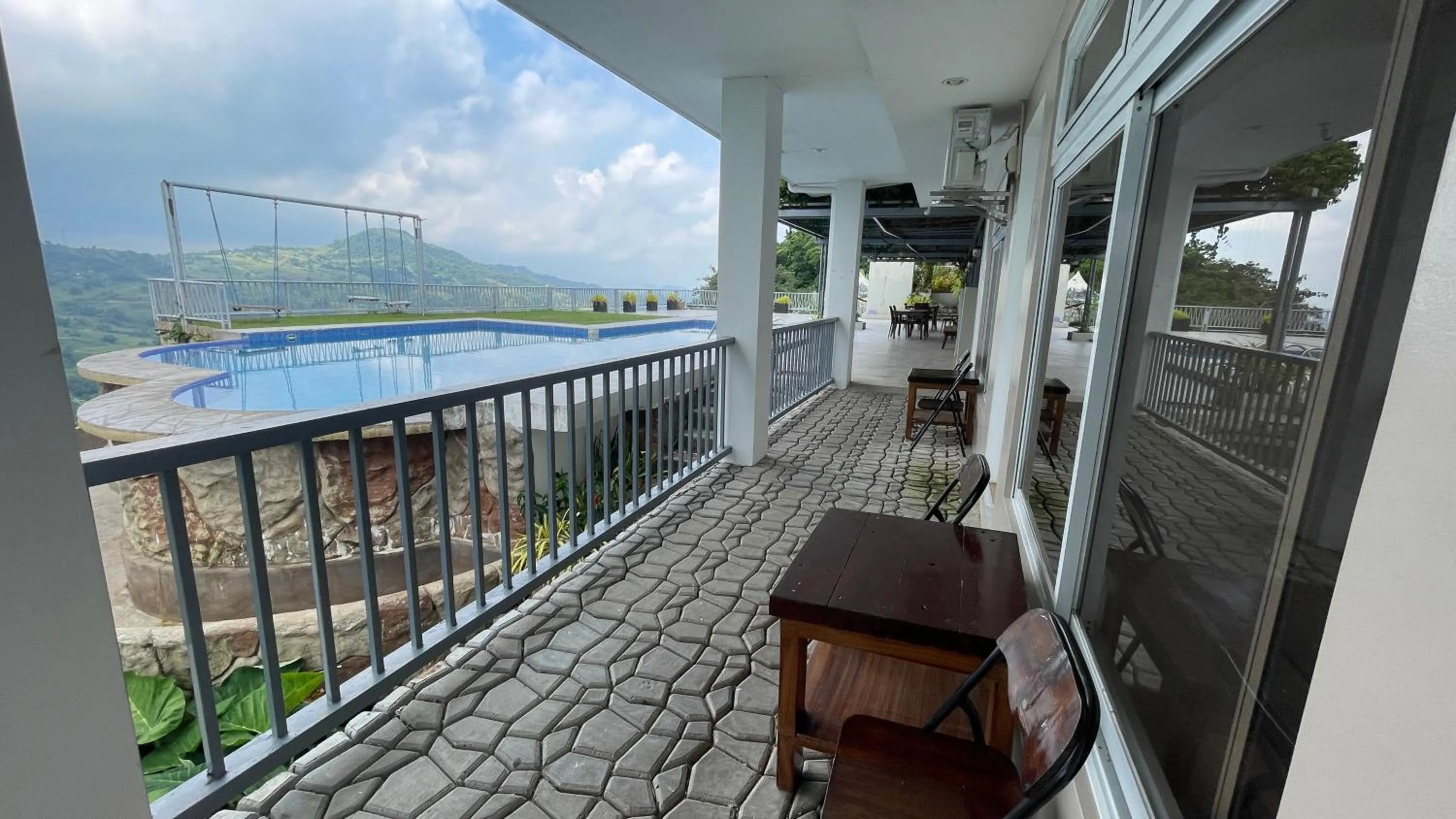 Swimming pool in Serenity Farm and Resort by Hiverooms