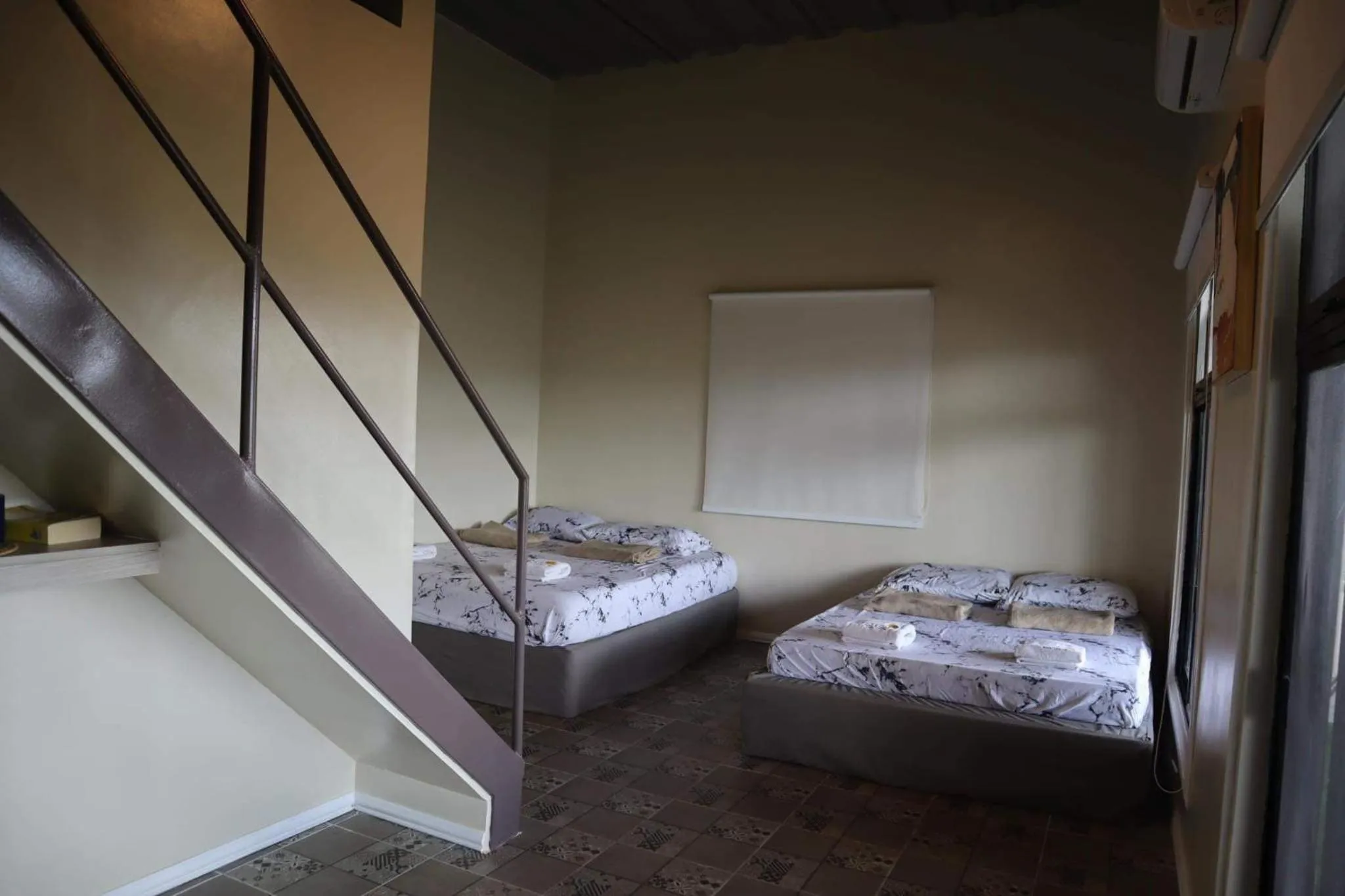 Bed in Serenity Farm and Resort by Hiverooms