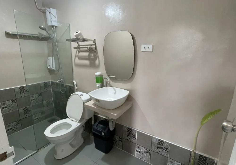 Bathroom in Serenity Farm and Resort by Hiverooms