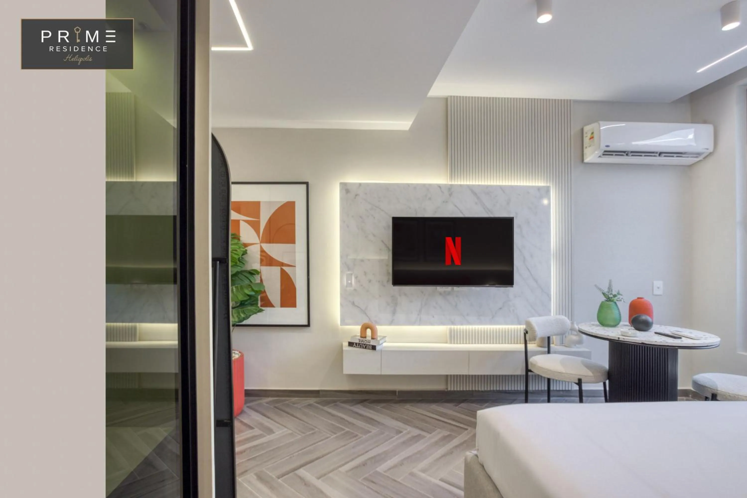 Communal lounge/ TV room, Bed in Prime Residence Heliopolis