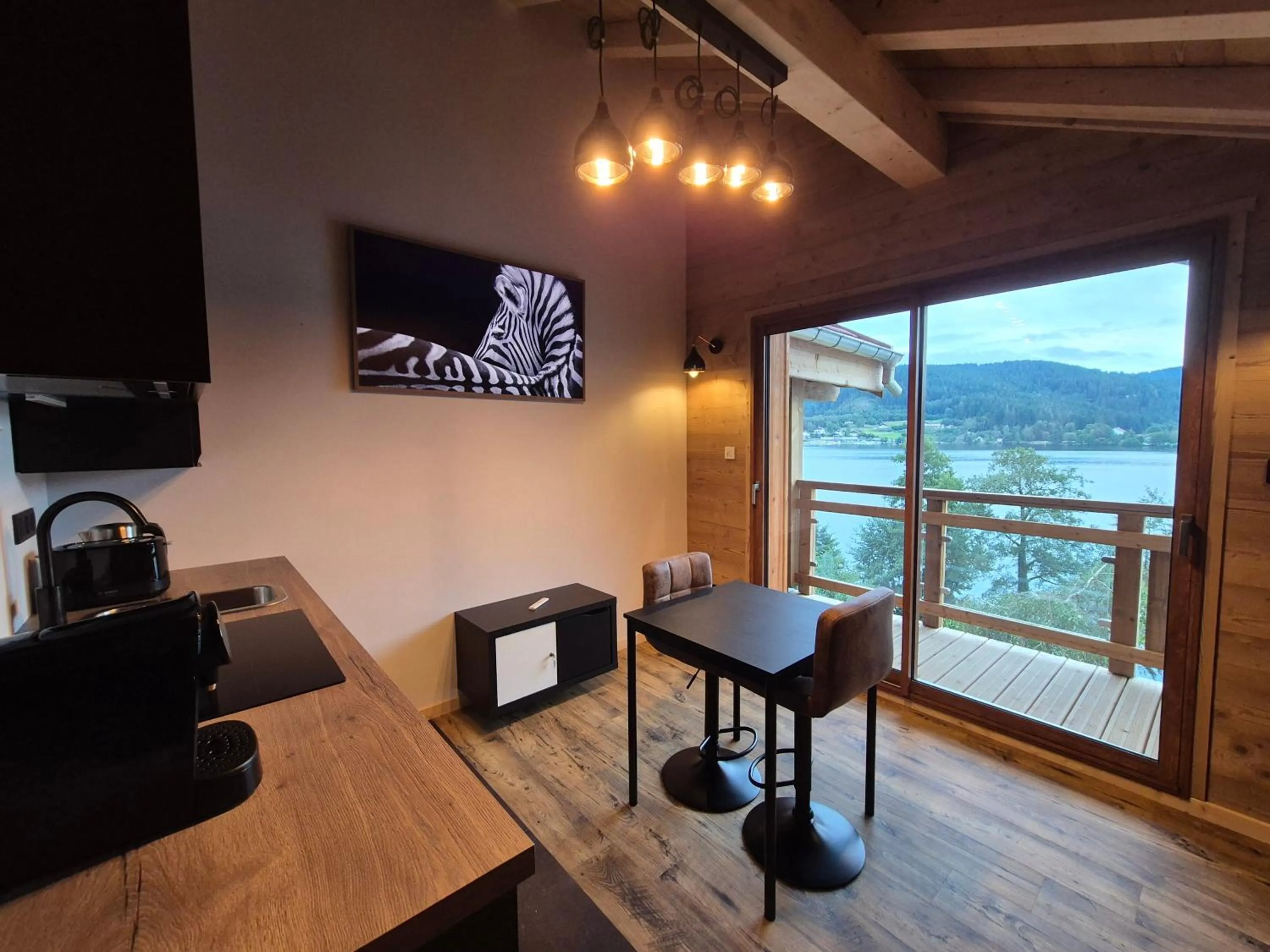 Communal lounge/ TV room in L'Or du Lac