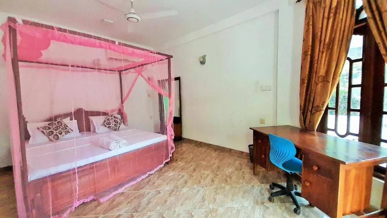 Bed in Bentota River Dilu Villa