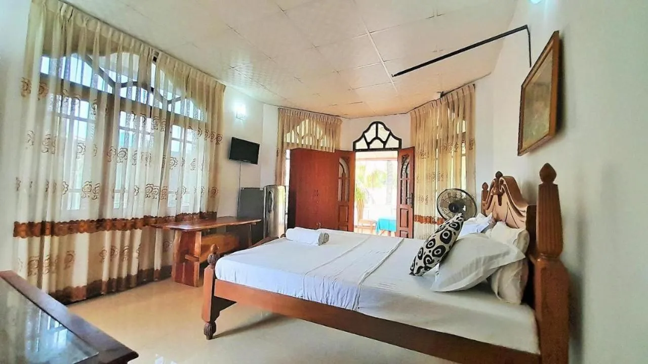 Bed in Bentota River Dilu Villa