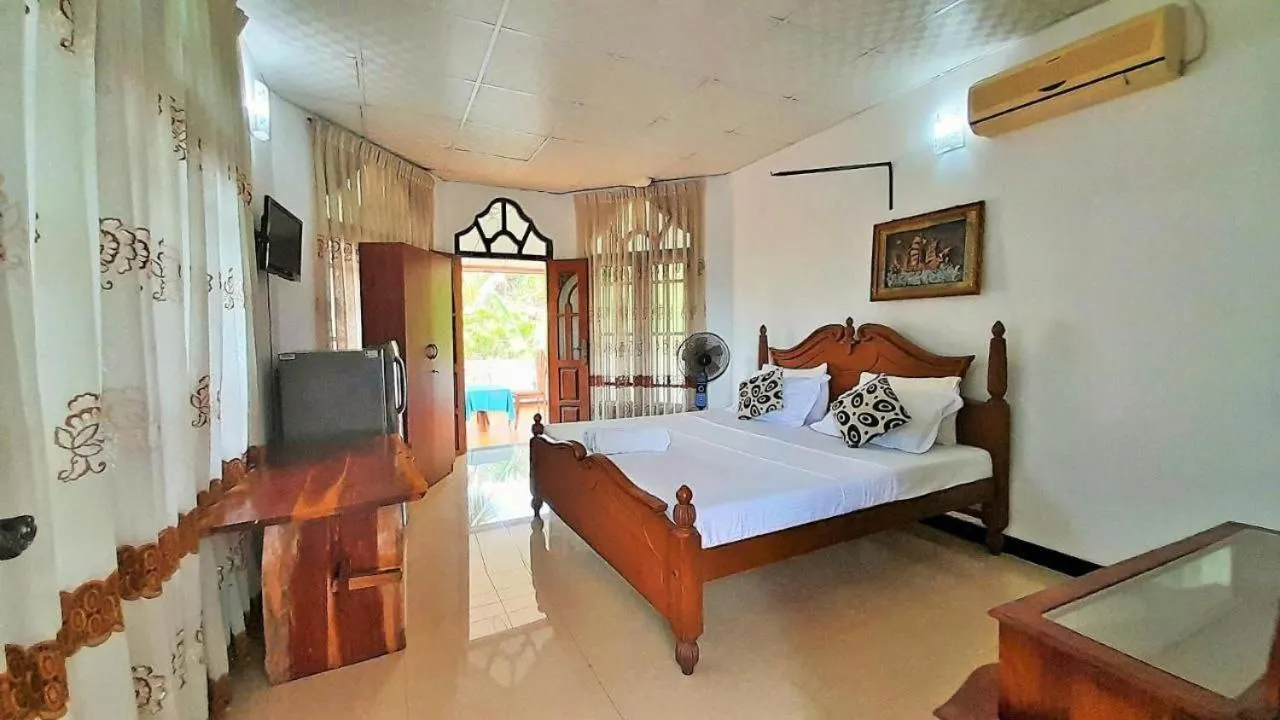Bed in Bentota River Dilu Villa