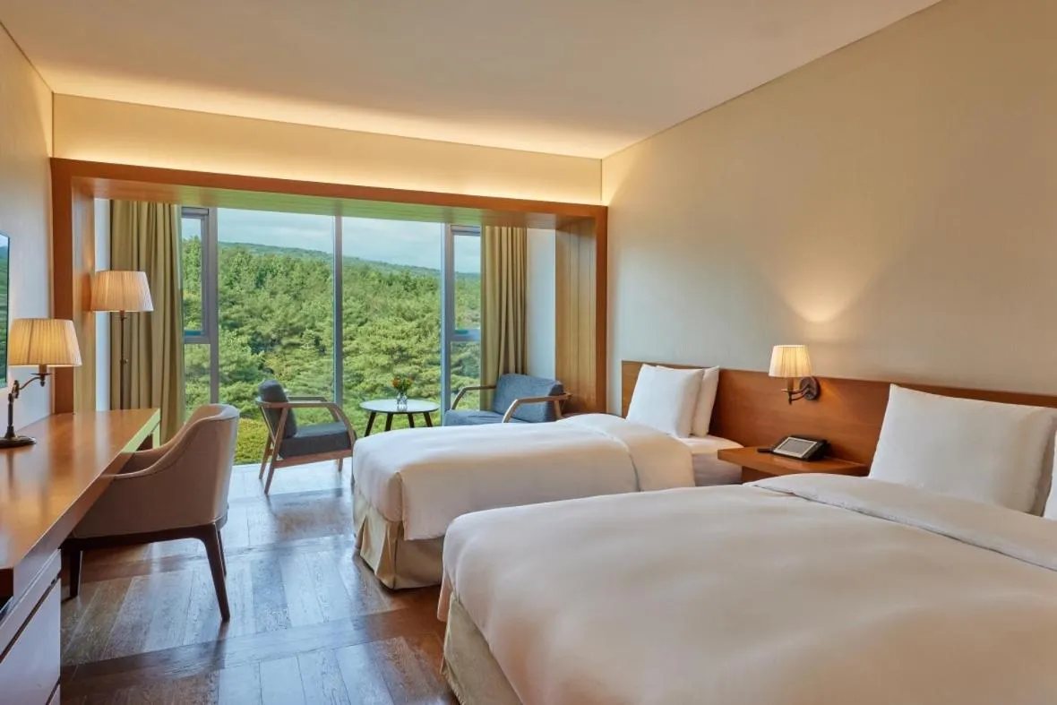 Bed in WE Hotel Jeju