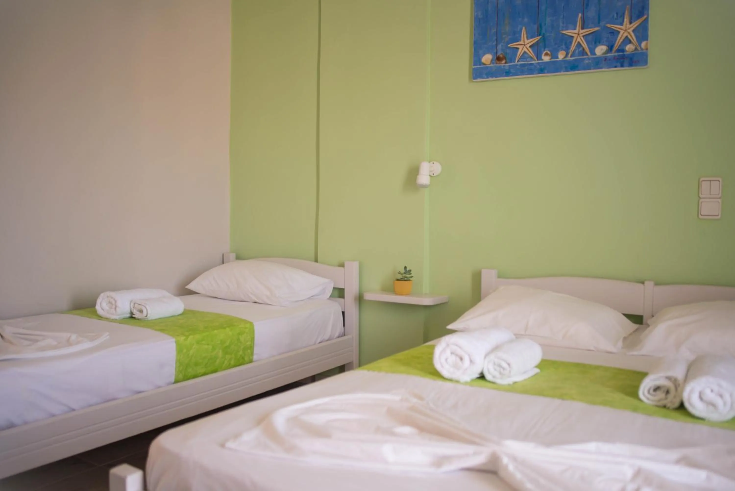 Bed in Nereides Hotel