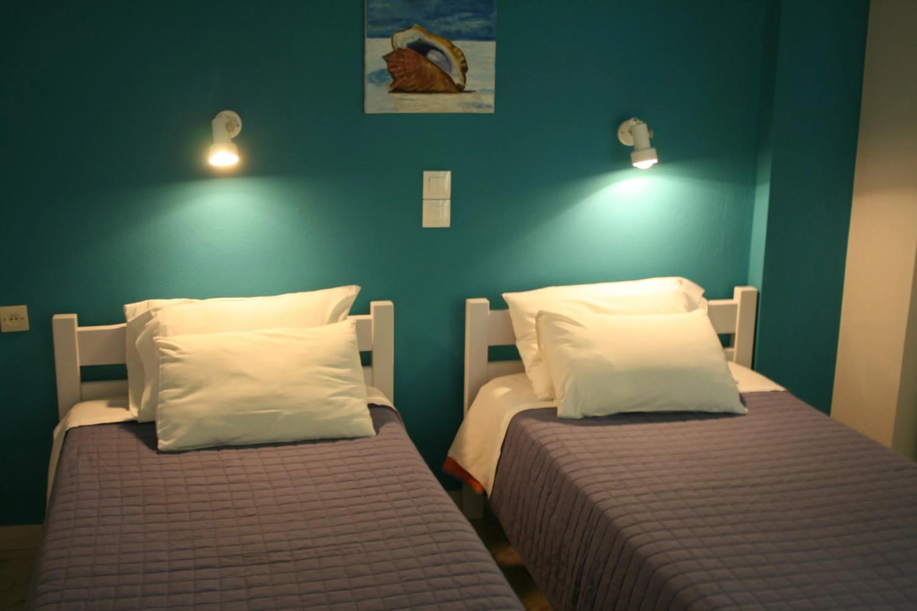 Bed in Nereides Hotel