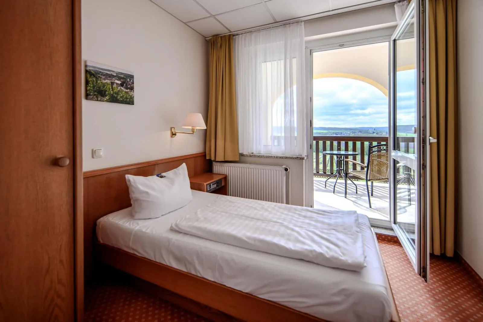 Bed in Hotel Rebschule