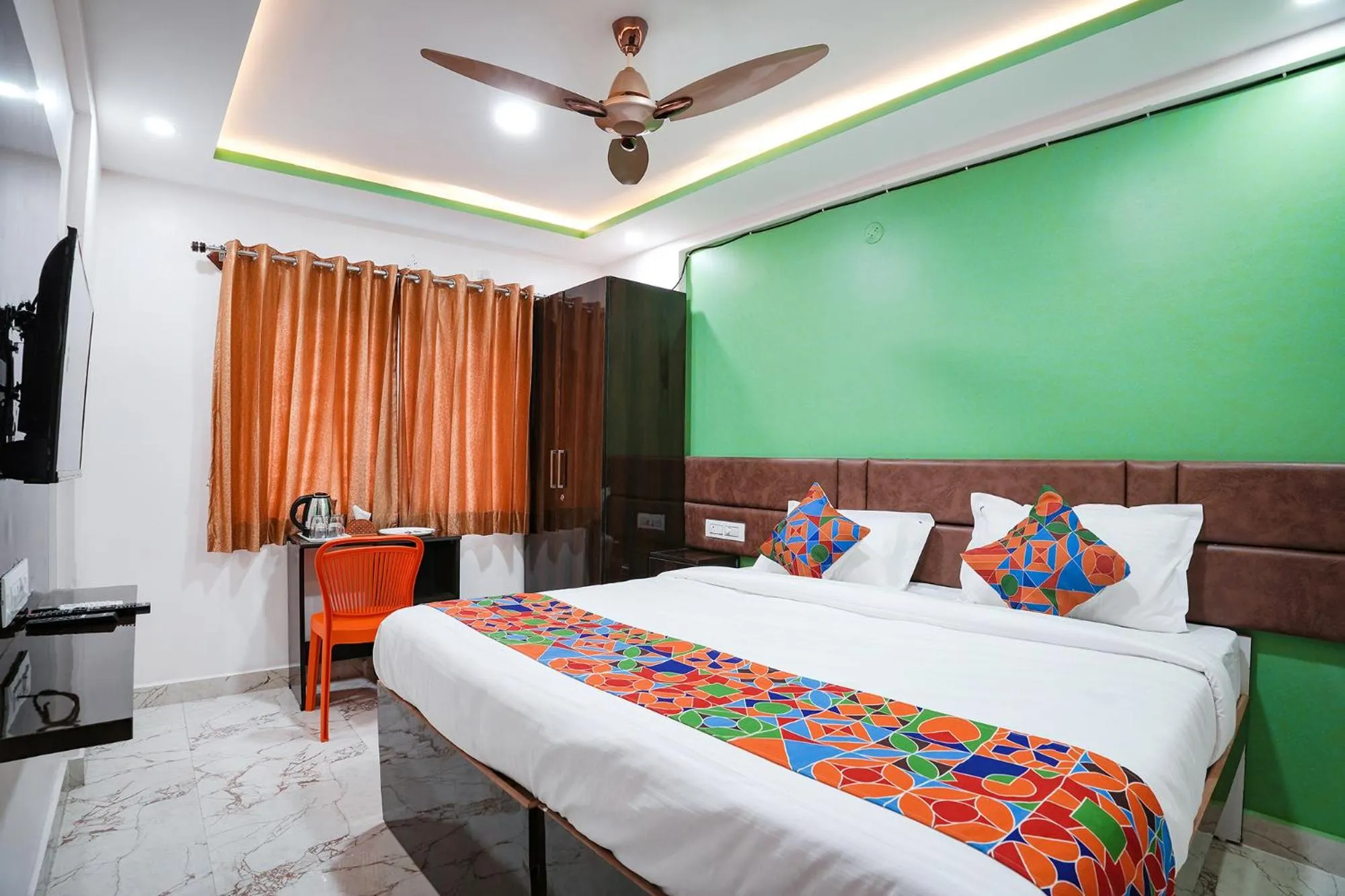Bed in FabHotel A White Pearl Suites - Yelahanka