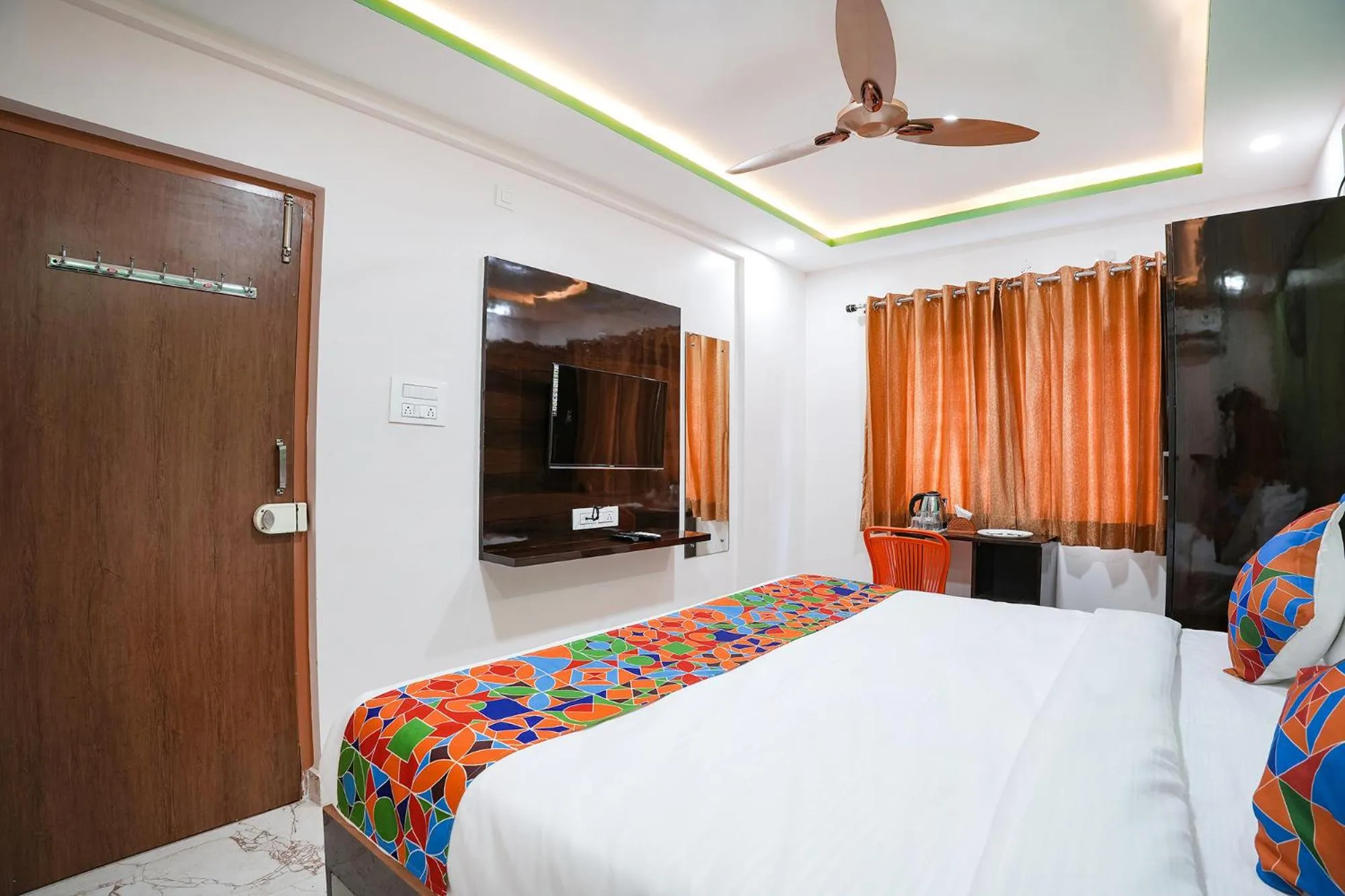Bed in FabHotel A White Pearl Suites - Yelahanka