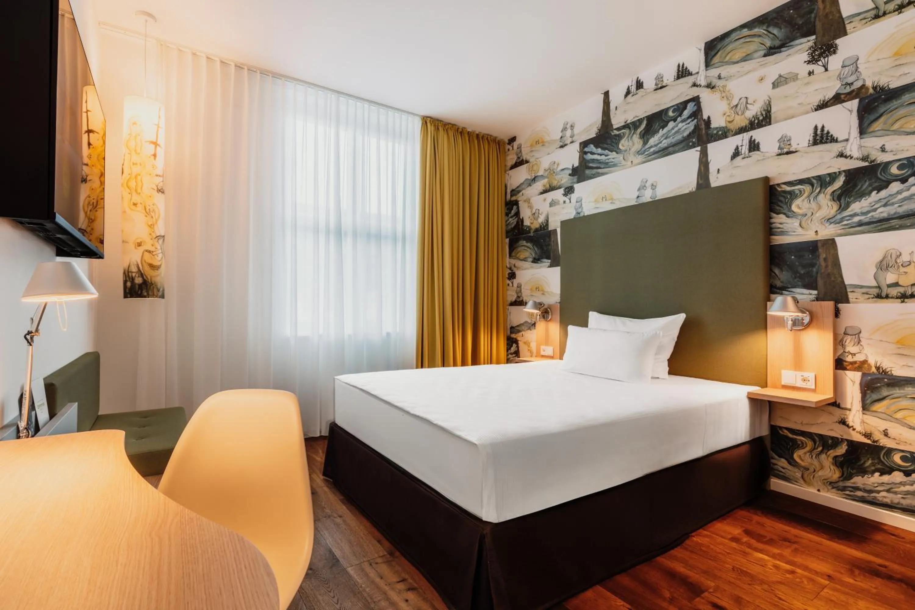 Bed in Grimms Hotel Hanau