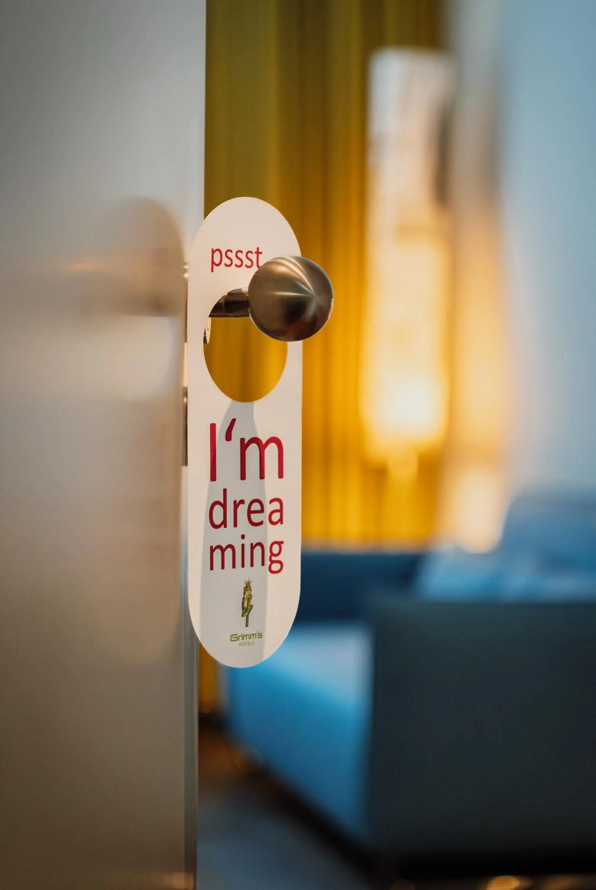 Seating area, Bed in Grimms Hotel Hanau