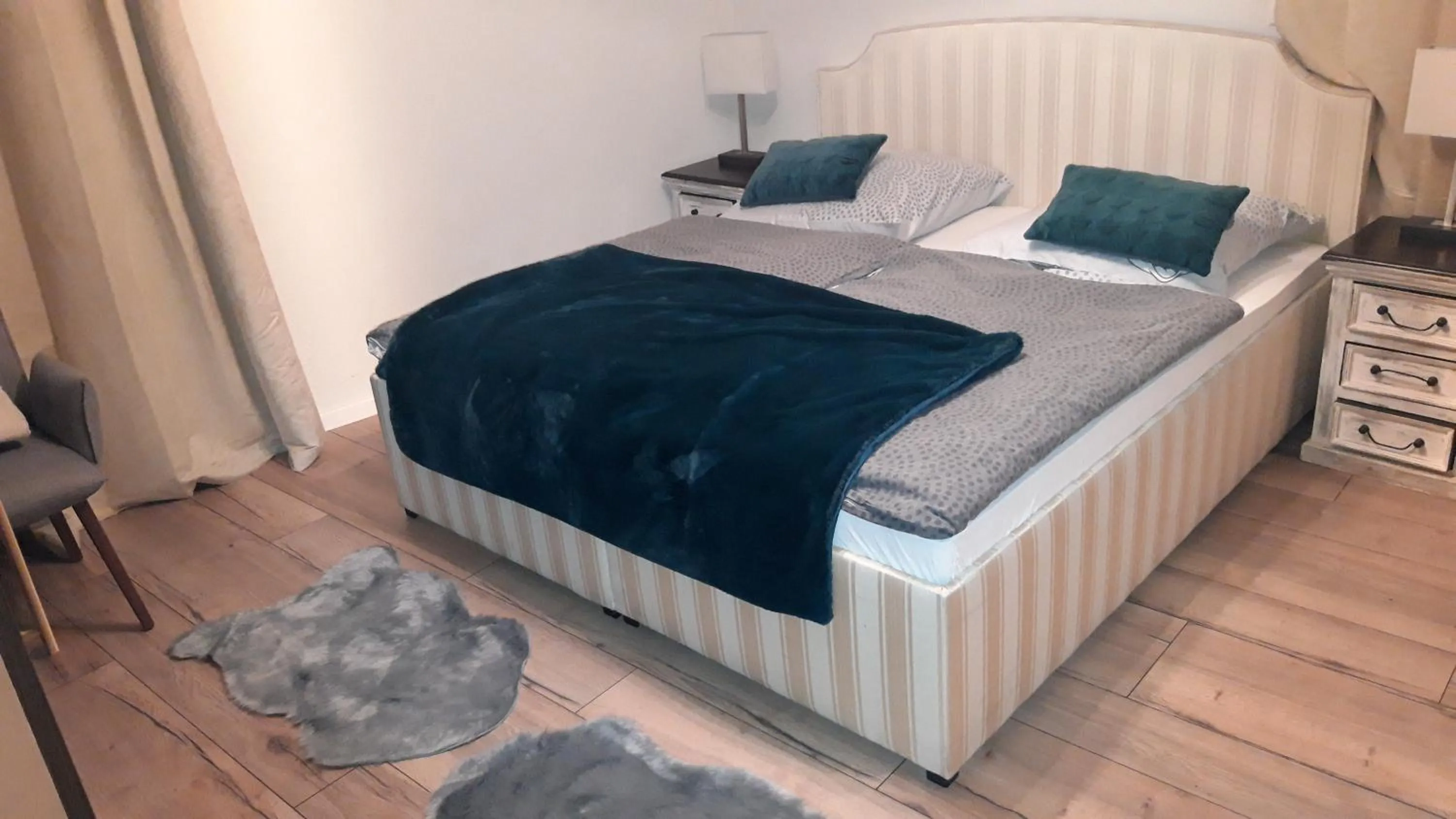 Bed in FHS ApartHotel