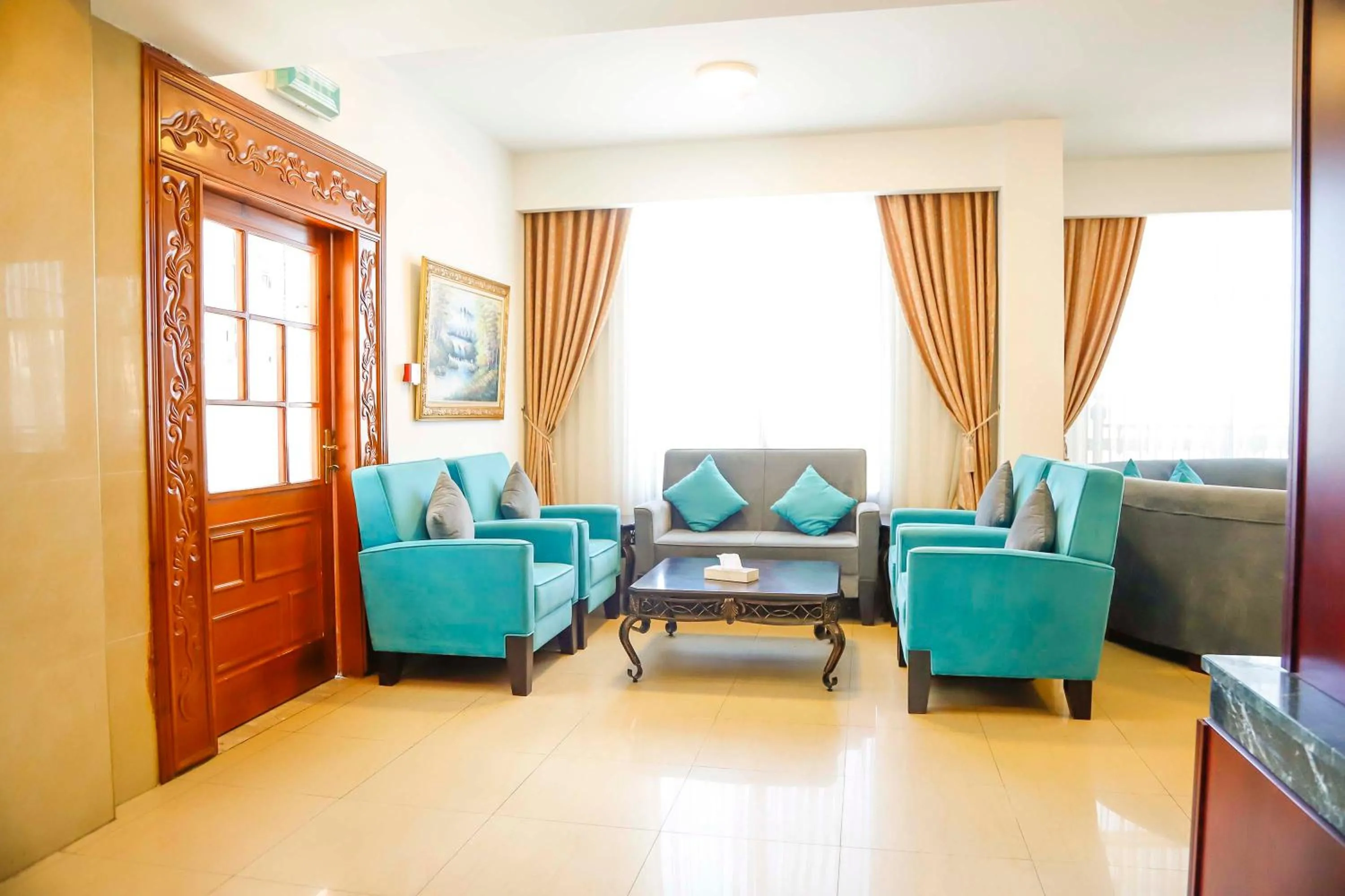 Seating area in City Inn Palace Hotel