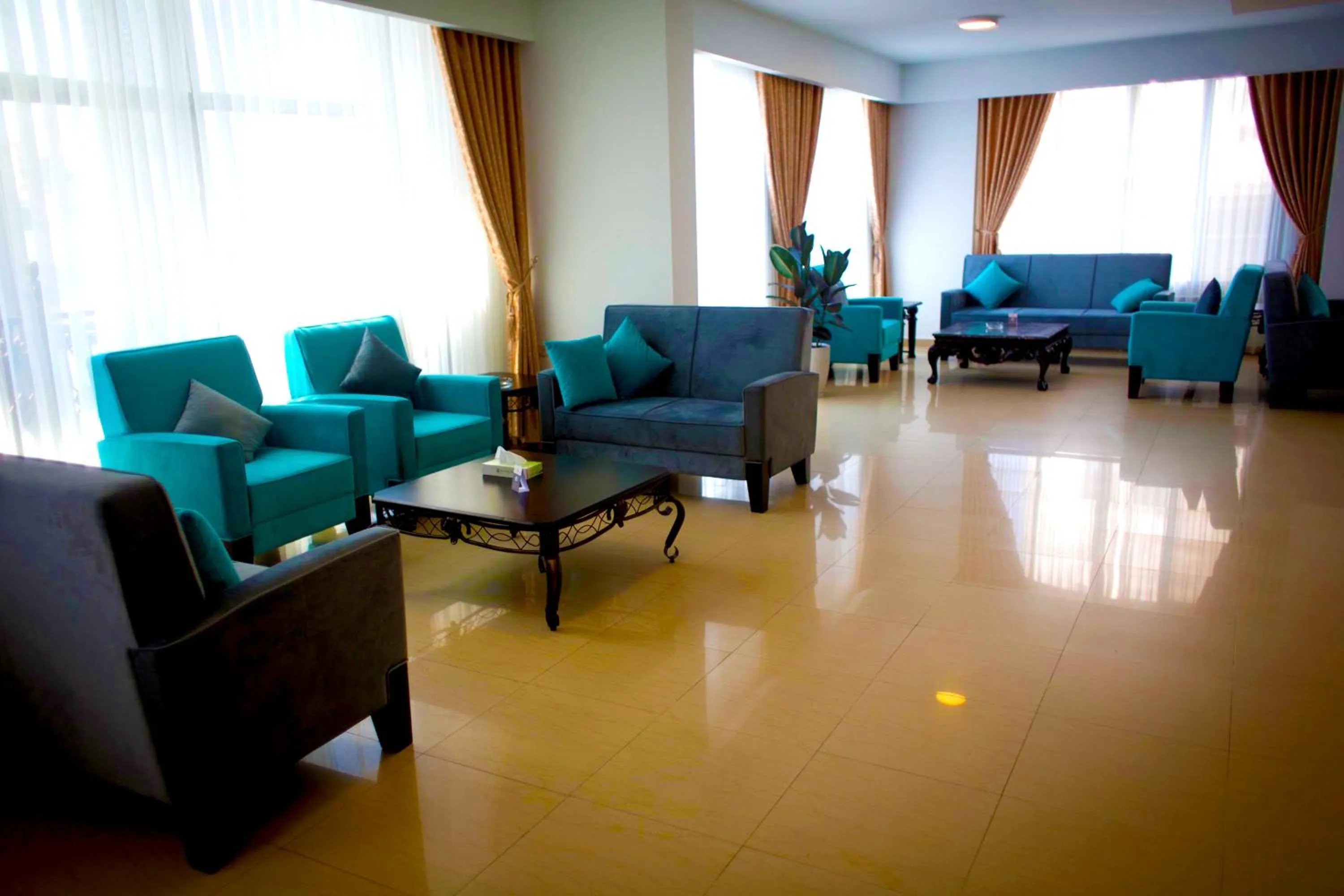 Communal lounge/ TV room in City Inn Palace Hotel