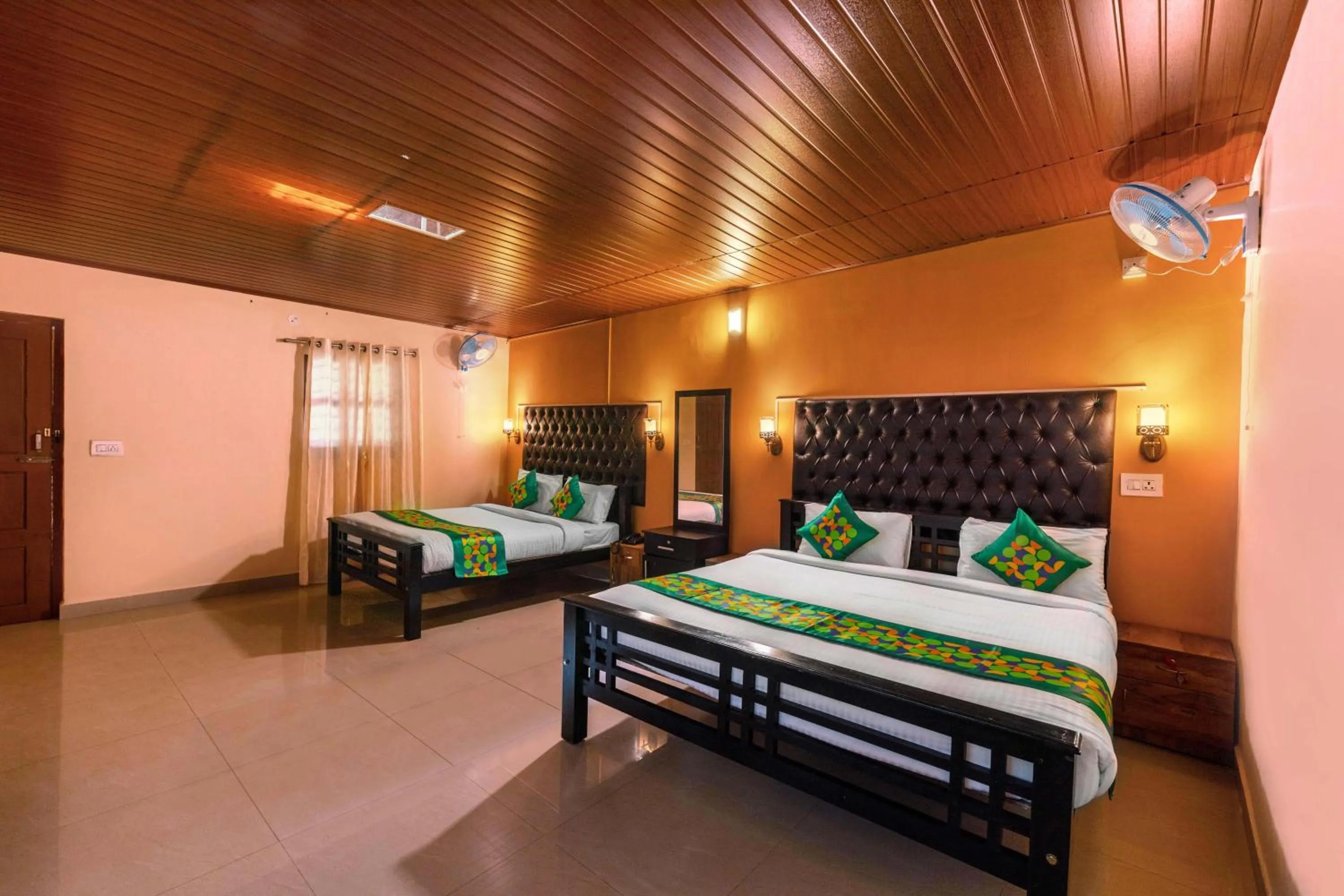 Bedroom in Treebo River View