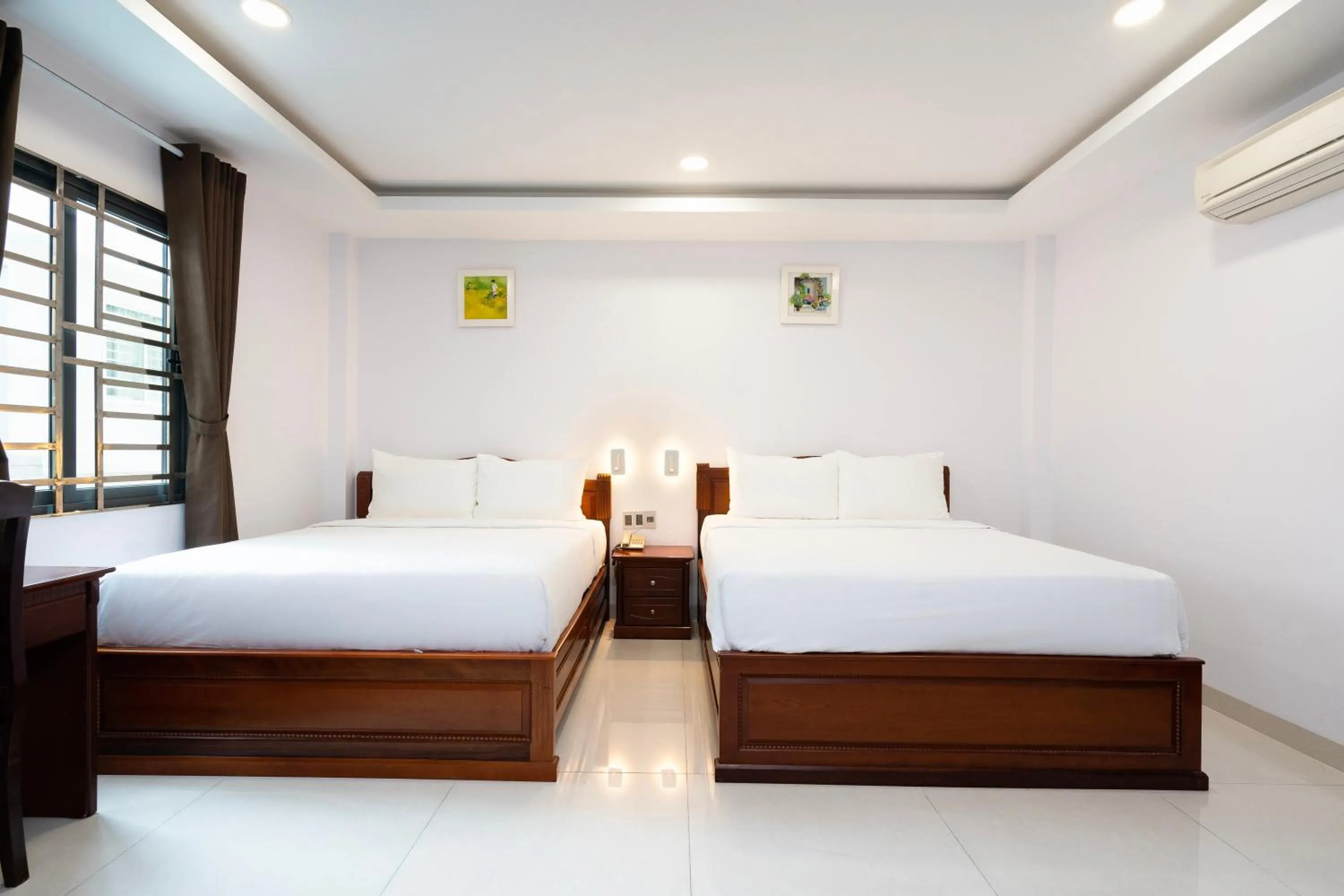 Bedroom, Bed in Hoang Luxury Hotel Dist 1 Ho Chi Minh