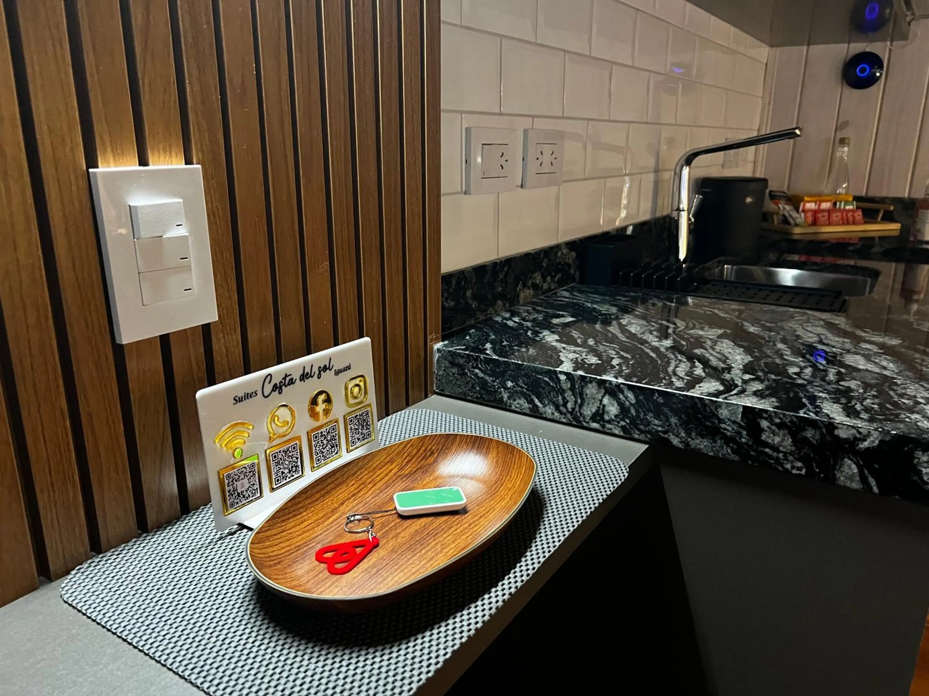 Property logo or sign in Costa del Sol Iguazú Suites