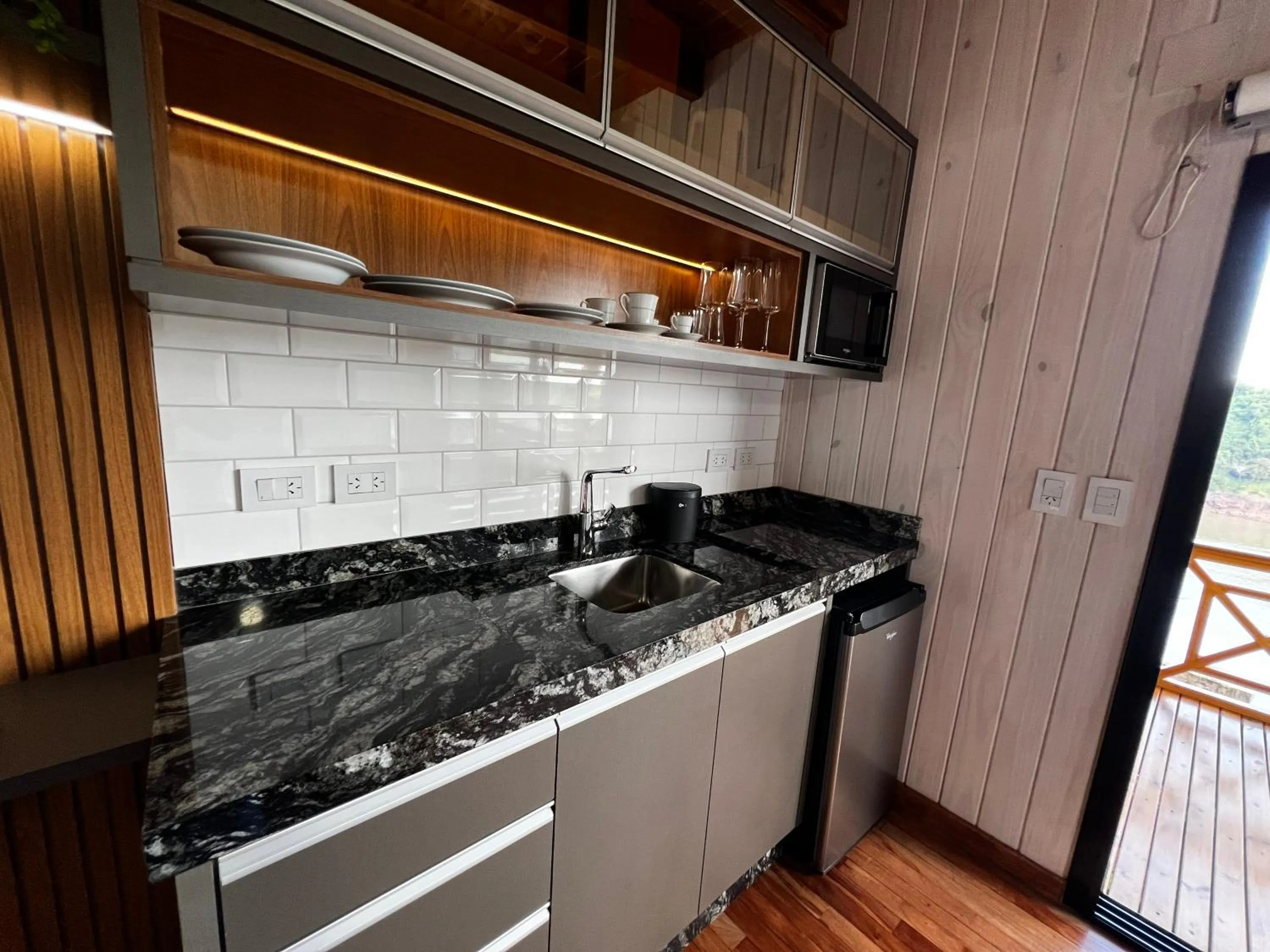 Kitchen or kitchenette in Costa del Sol Iguazú Suites