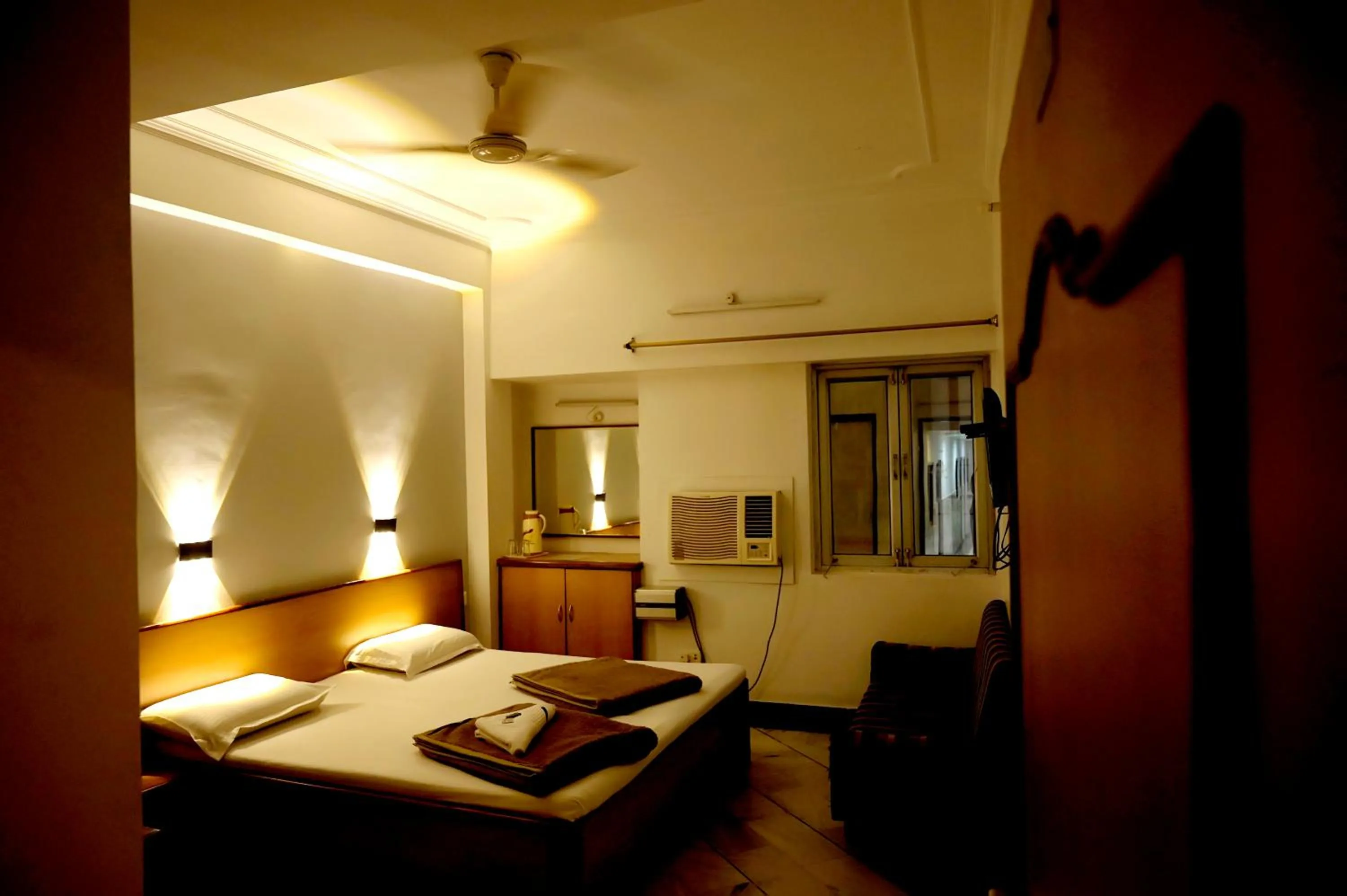 Bed in Subhash Hotel