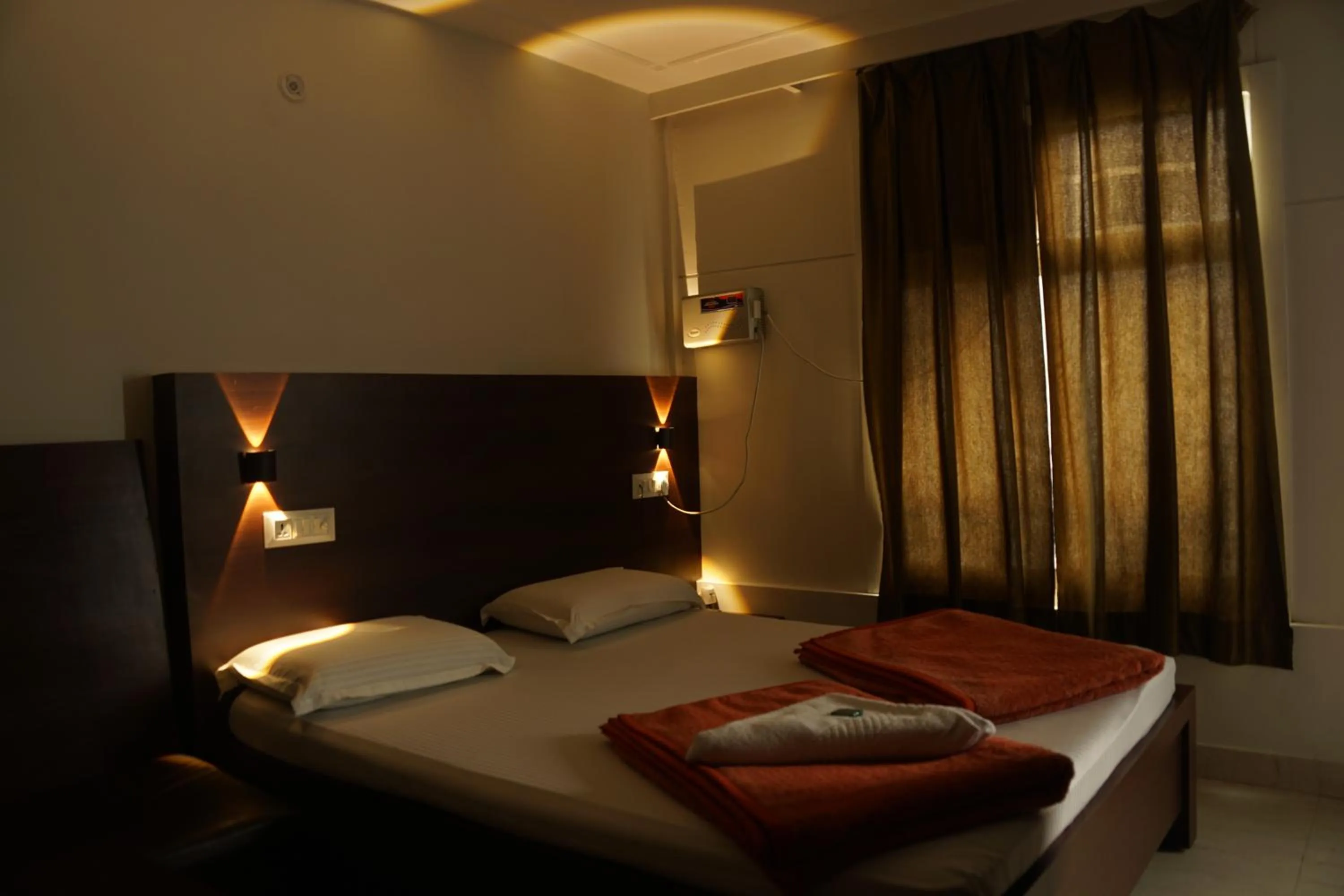 Bed in Subhash Hotel