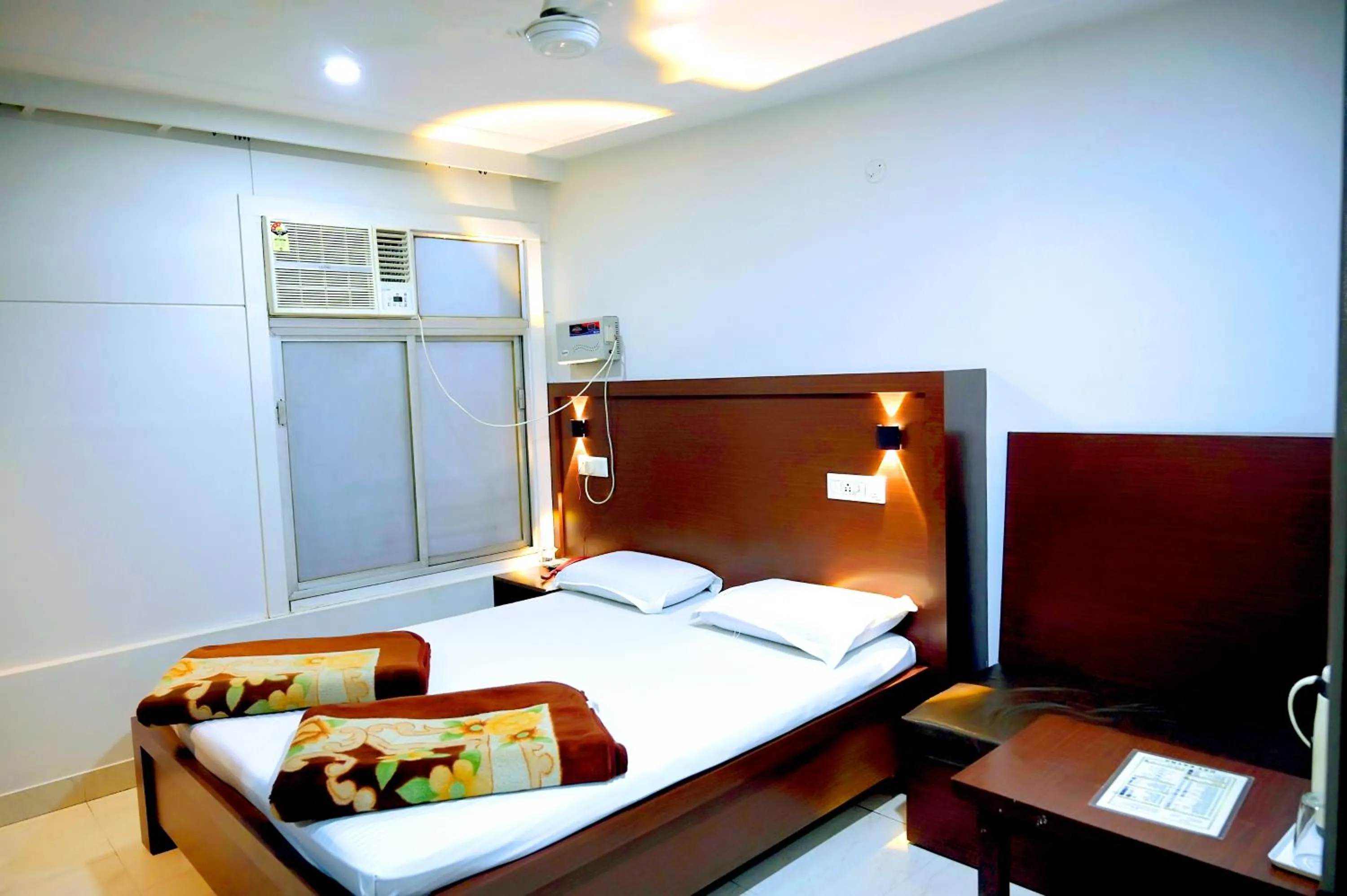 Bed in Subhash Hotel