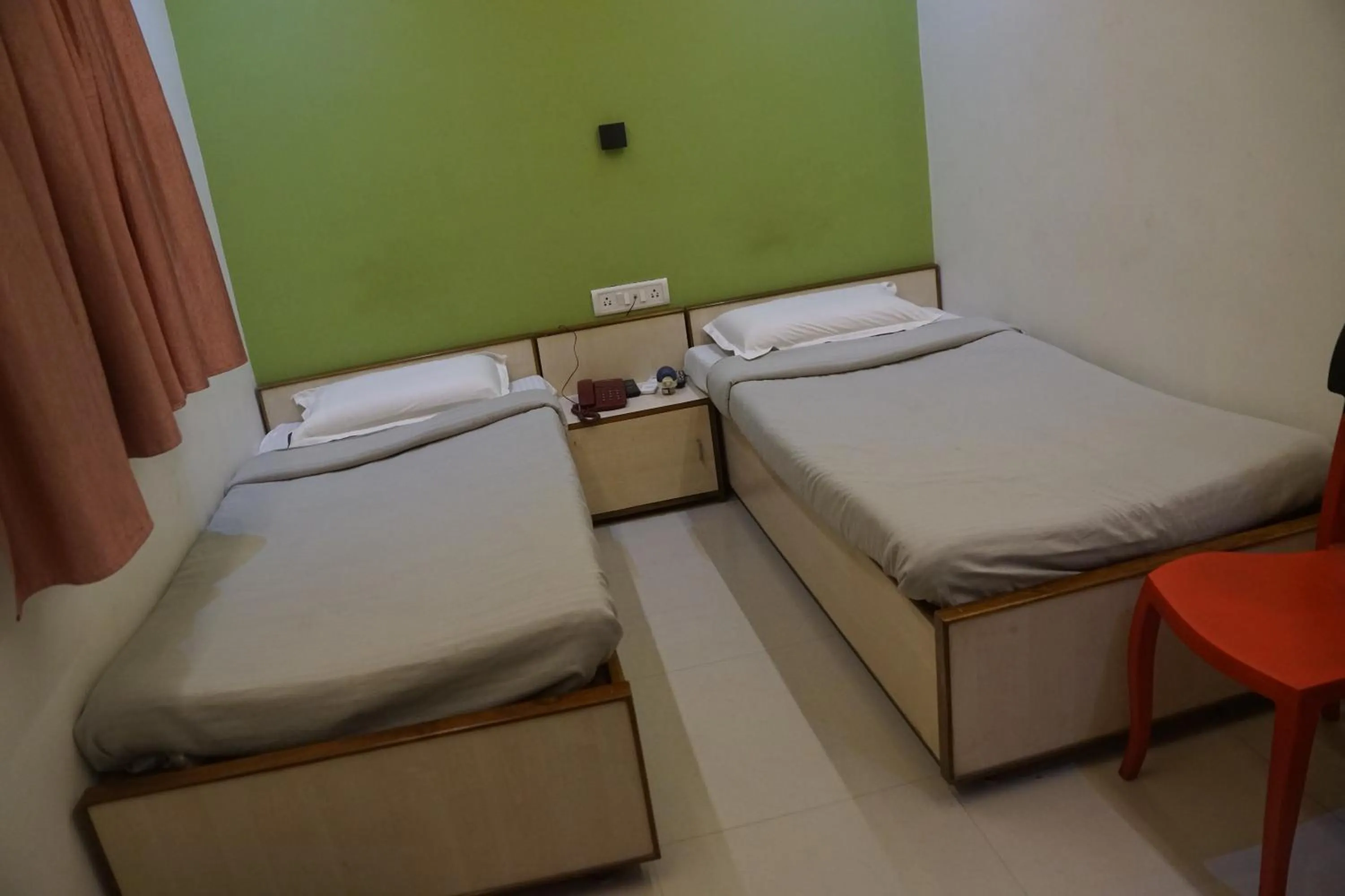 Bed in Subhash Hotel