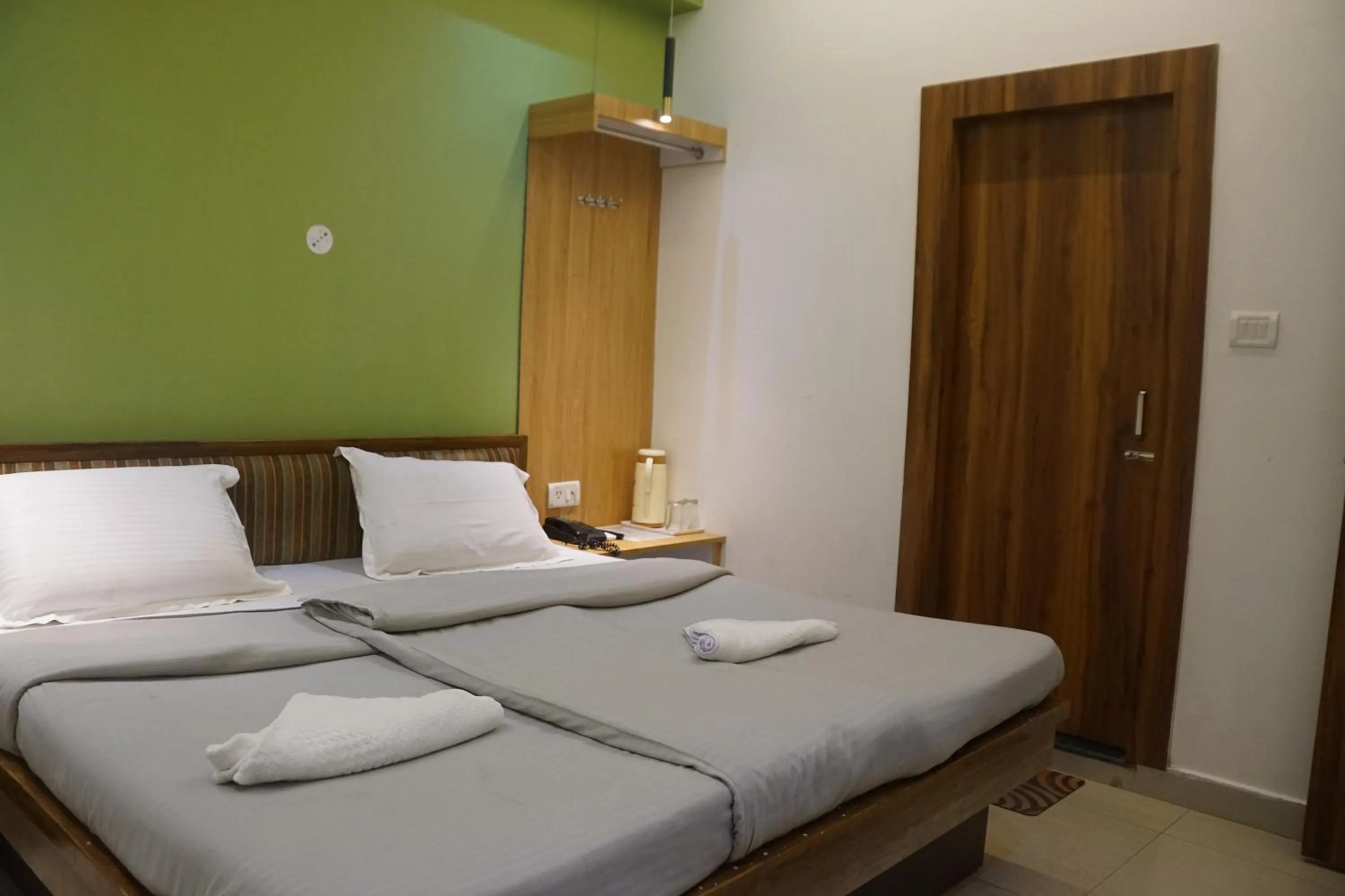 Bed in Subhash Hotel