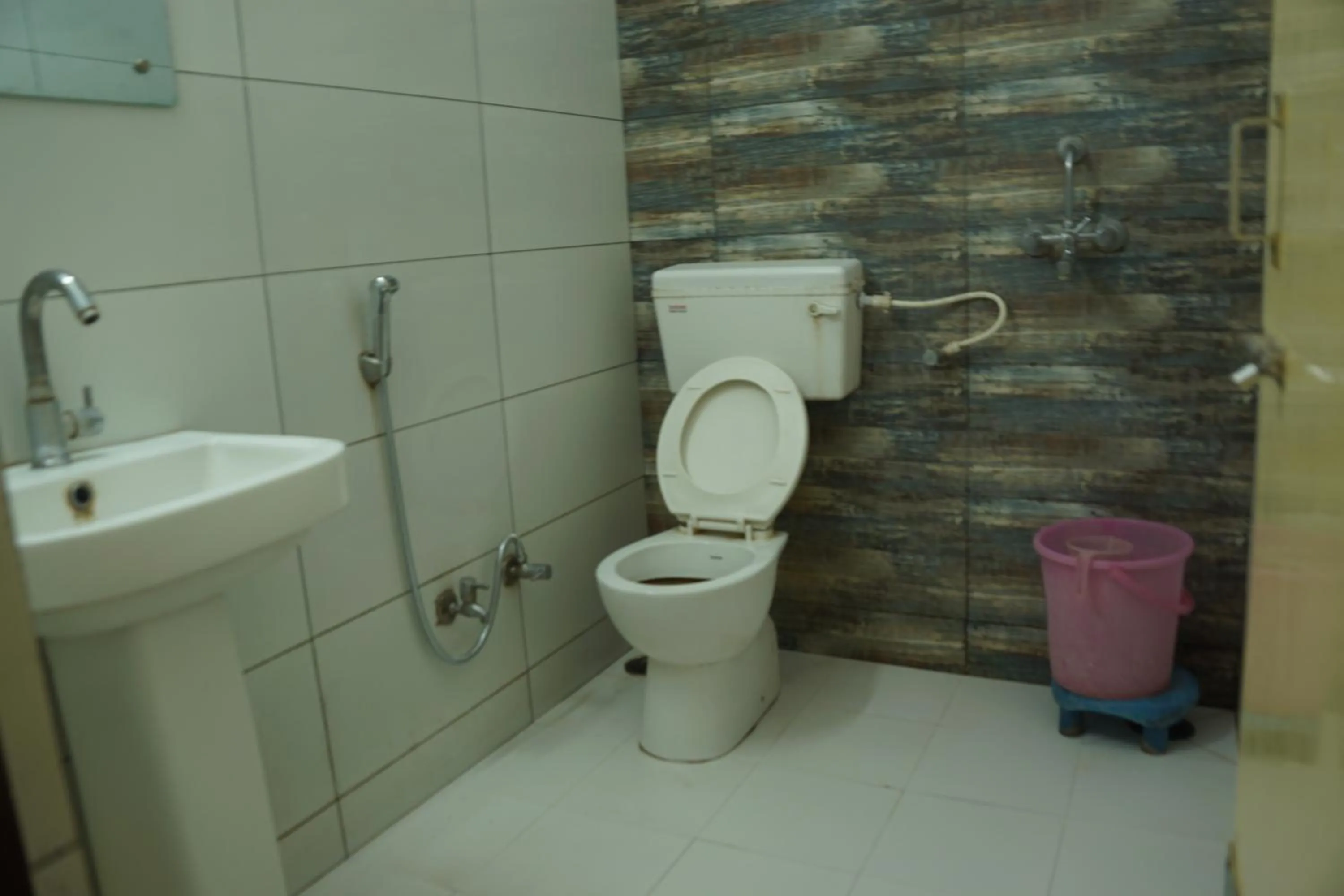 Bathroom in Subhash Hotel