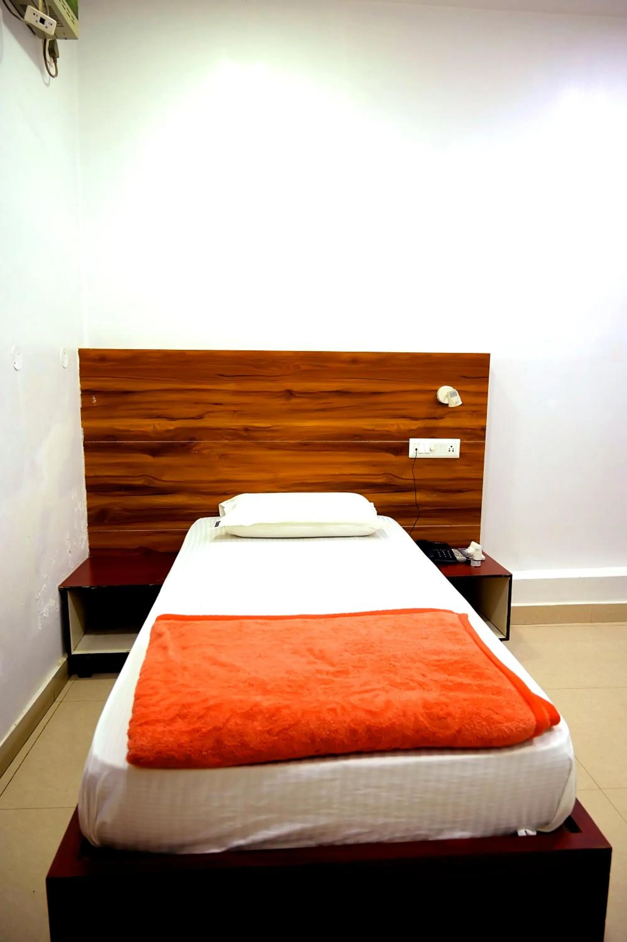 Bed in Subhash Hotel
