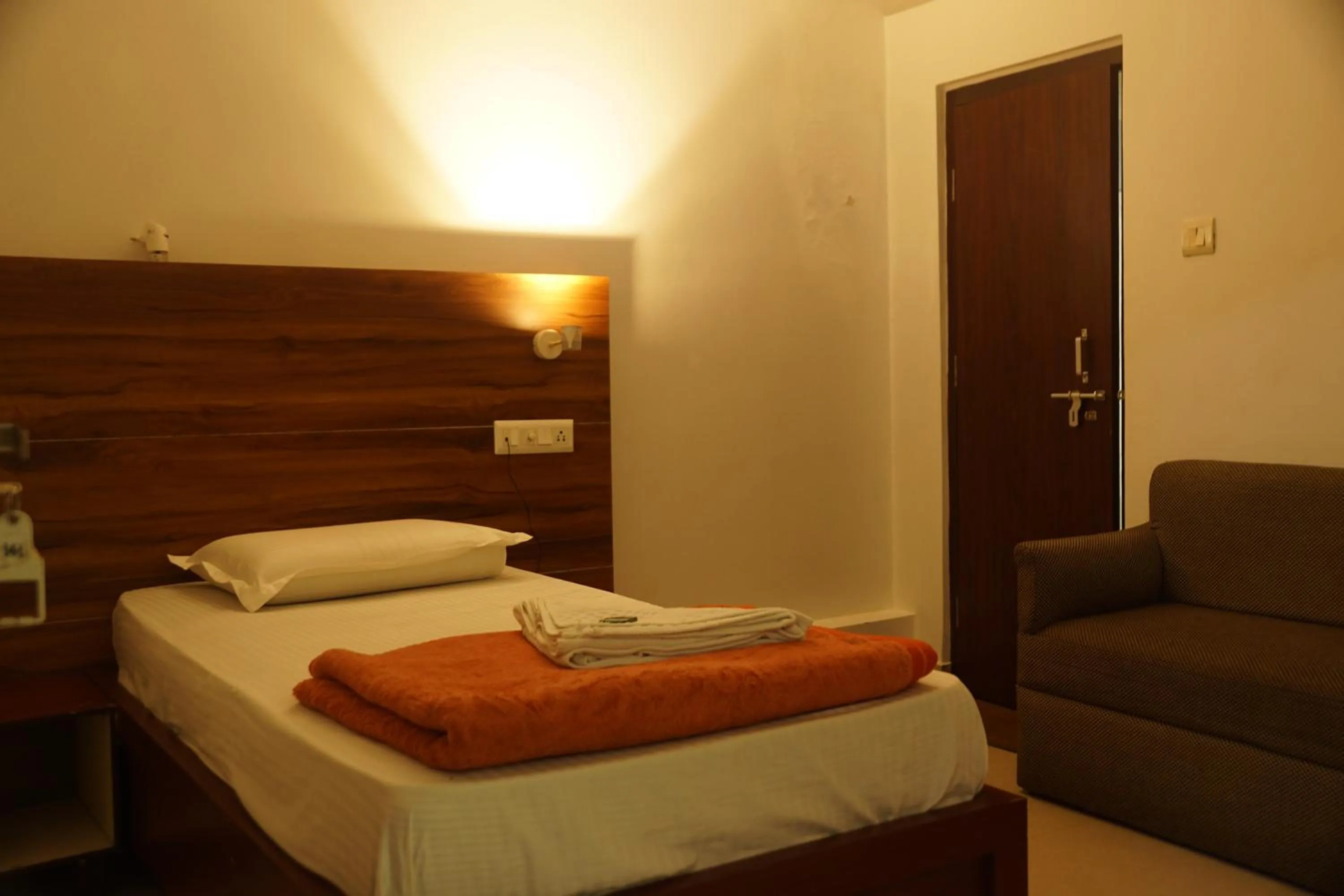 Bed in Subhash Hotel