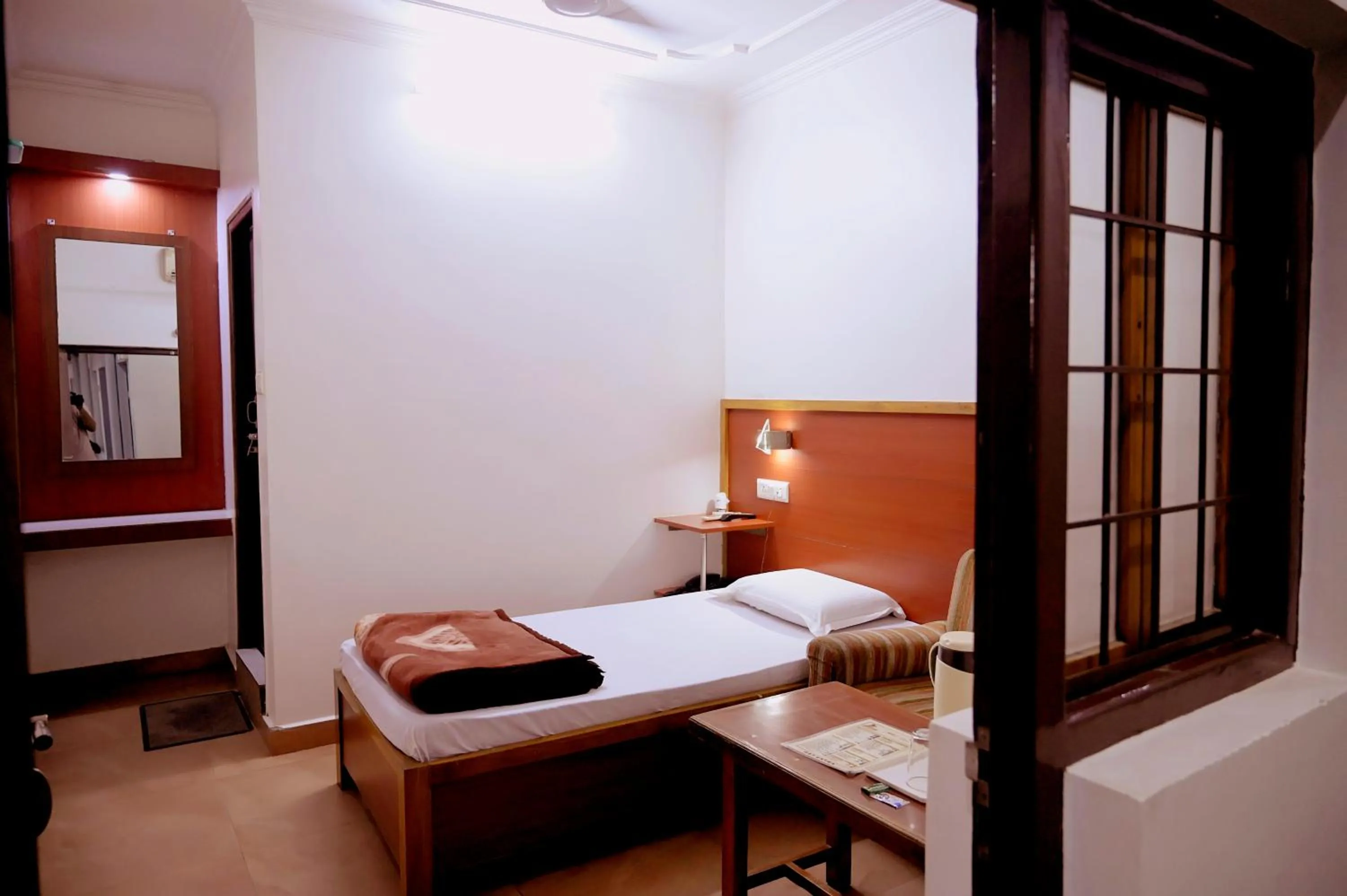 Bed in Subhash Hotel